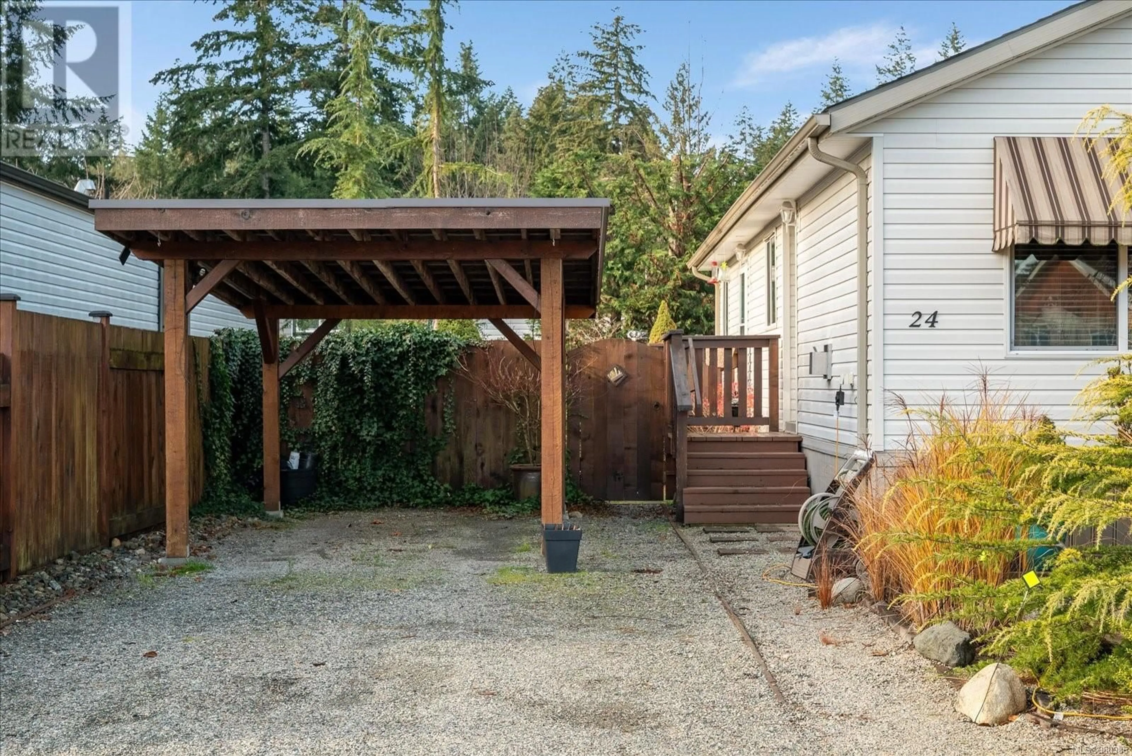 Patio, the fenced backyard for 24 3704 Melrose Rd, Whiskey Creek British Columbia V9K1V3