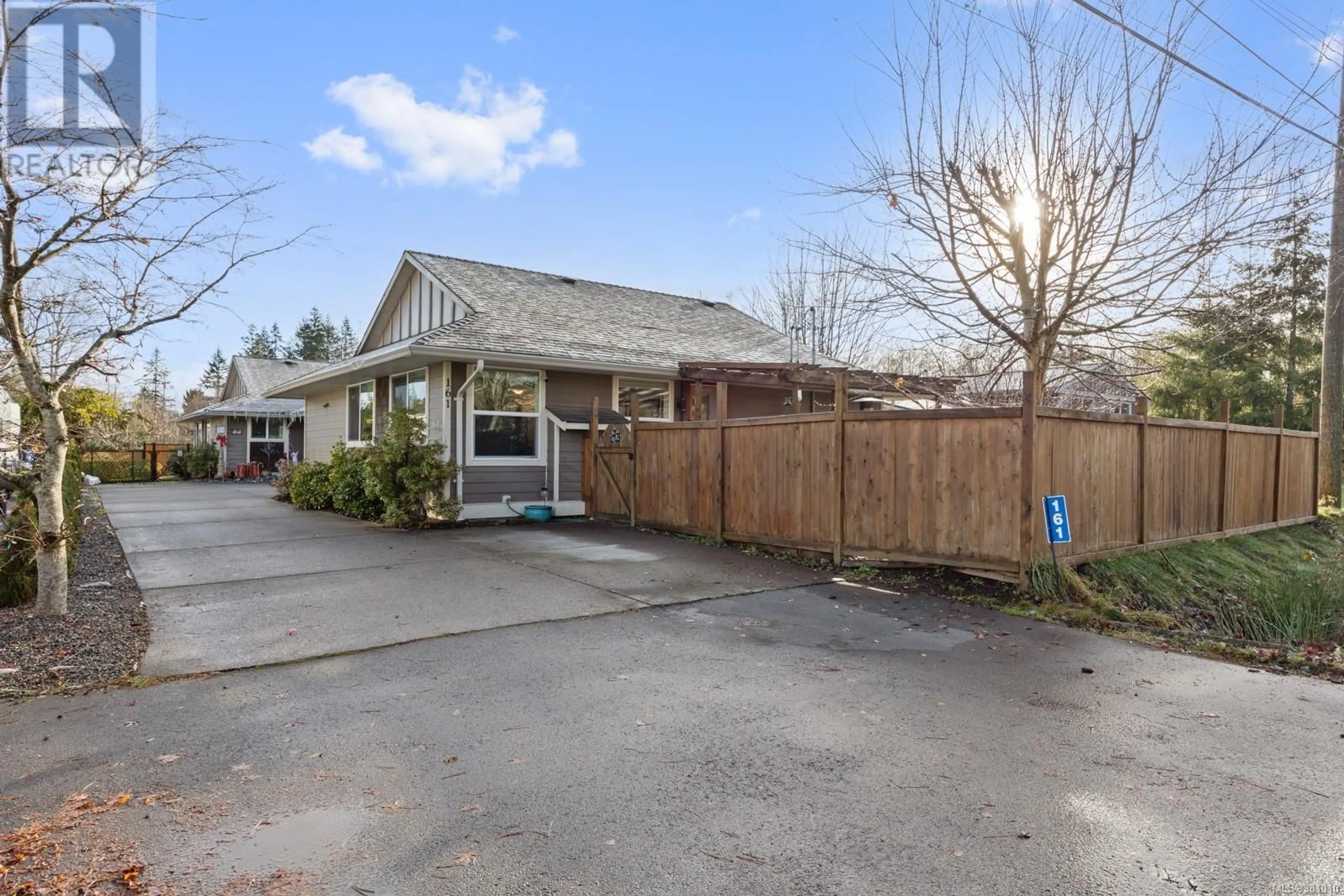 Frontside or backside of a home, the fenced backyard for A 161 Petersen Rd S, Campbell River British Columbia V9W3G8