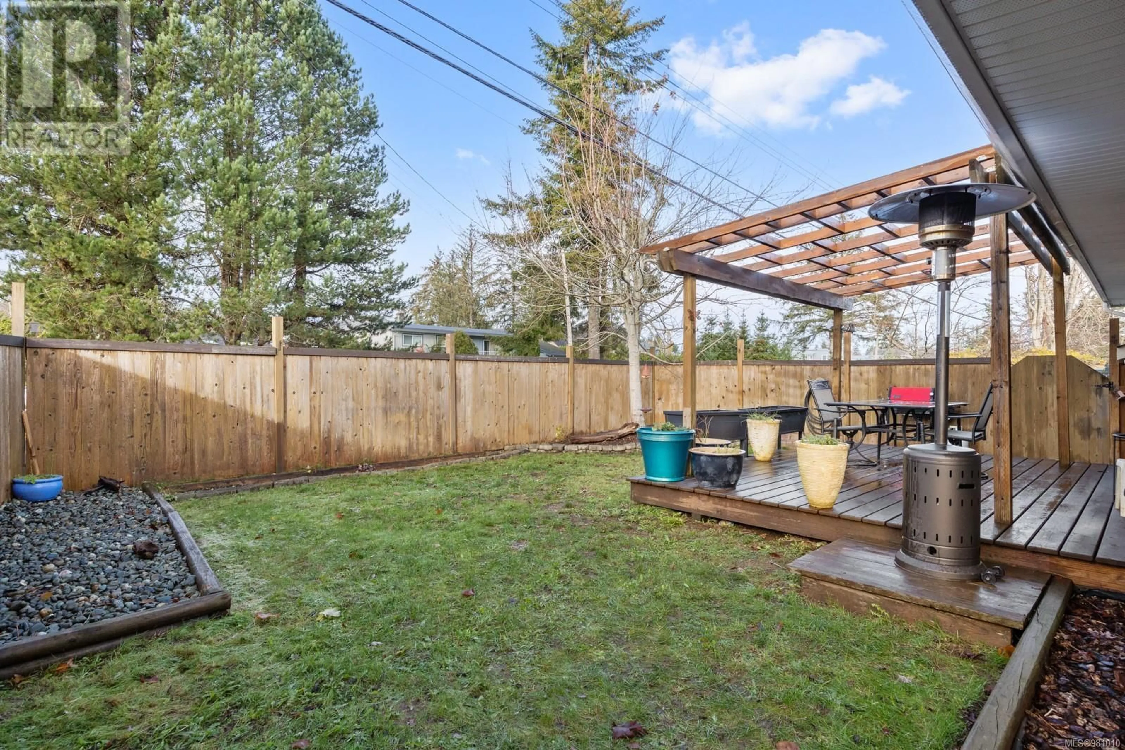 Patio, the fenced backyard for A 161 Petersen Rd S, Campbell River British Columbia V9W3G8