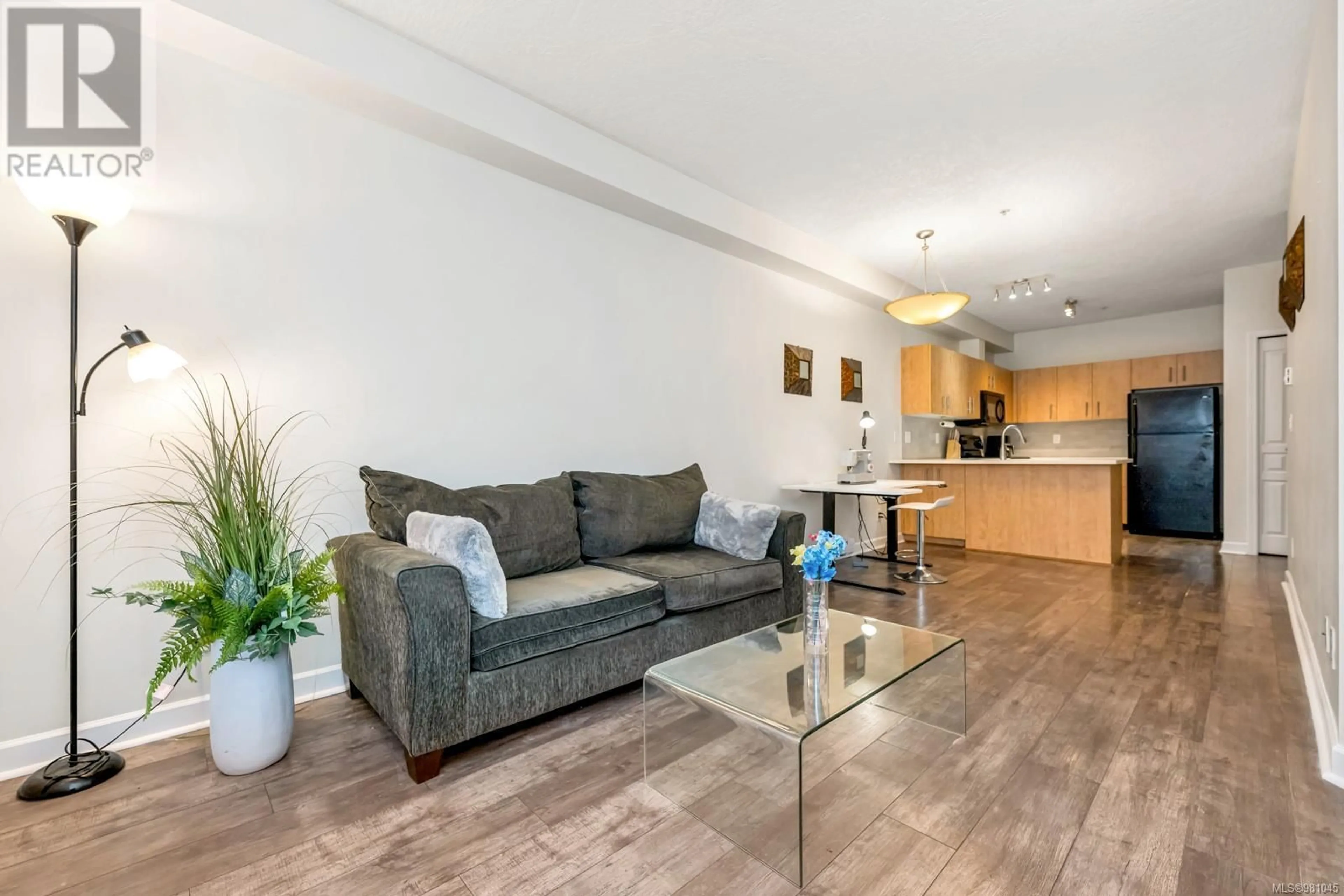 Living room, wood floors for 110 825 Goldstream Ave, Langford British Columbia V9B2X8