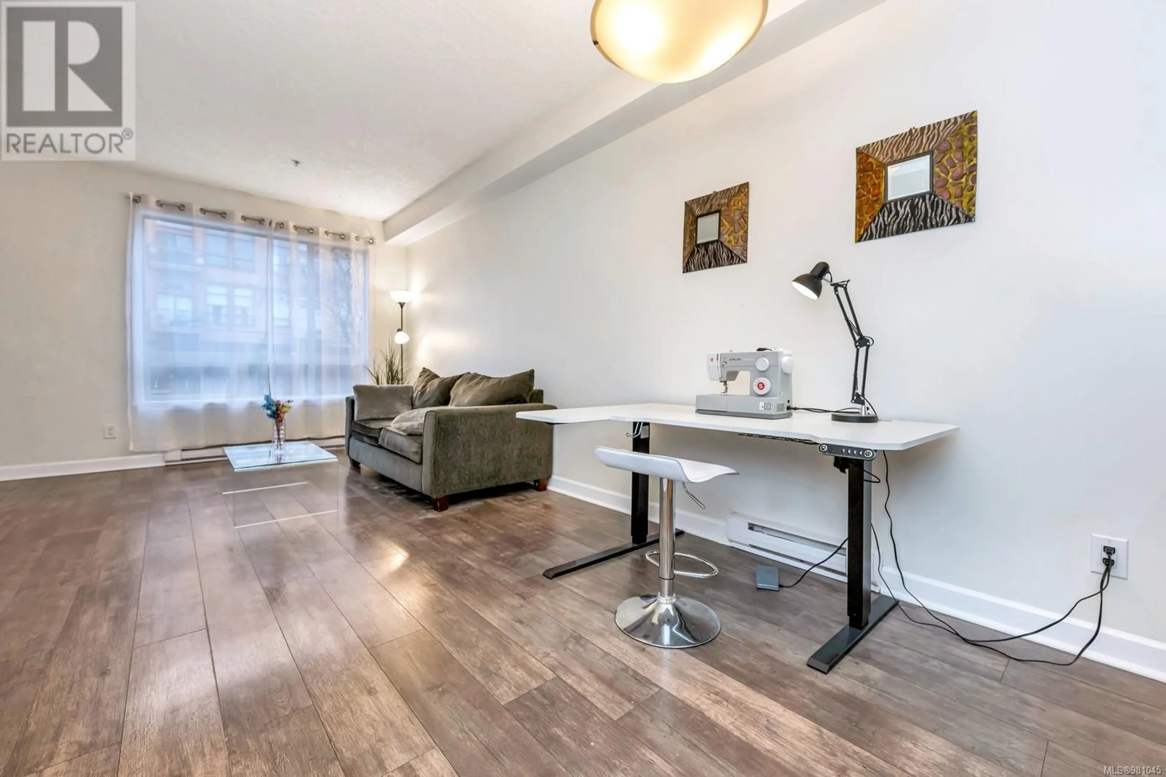 Living room, wood floors for 110 825 Goldstream Ave, Langford British Columbia V9B2X8