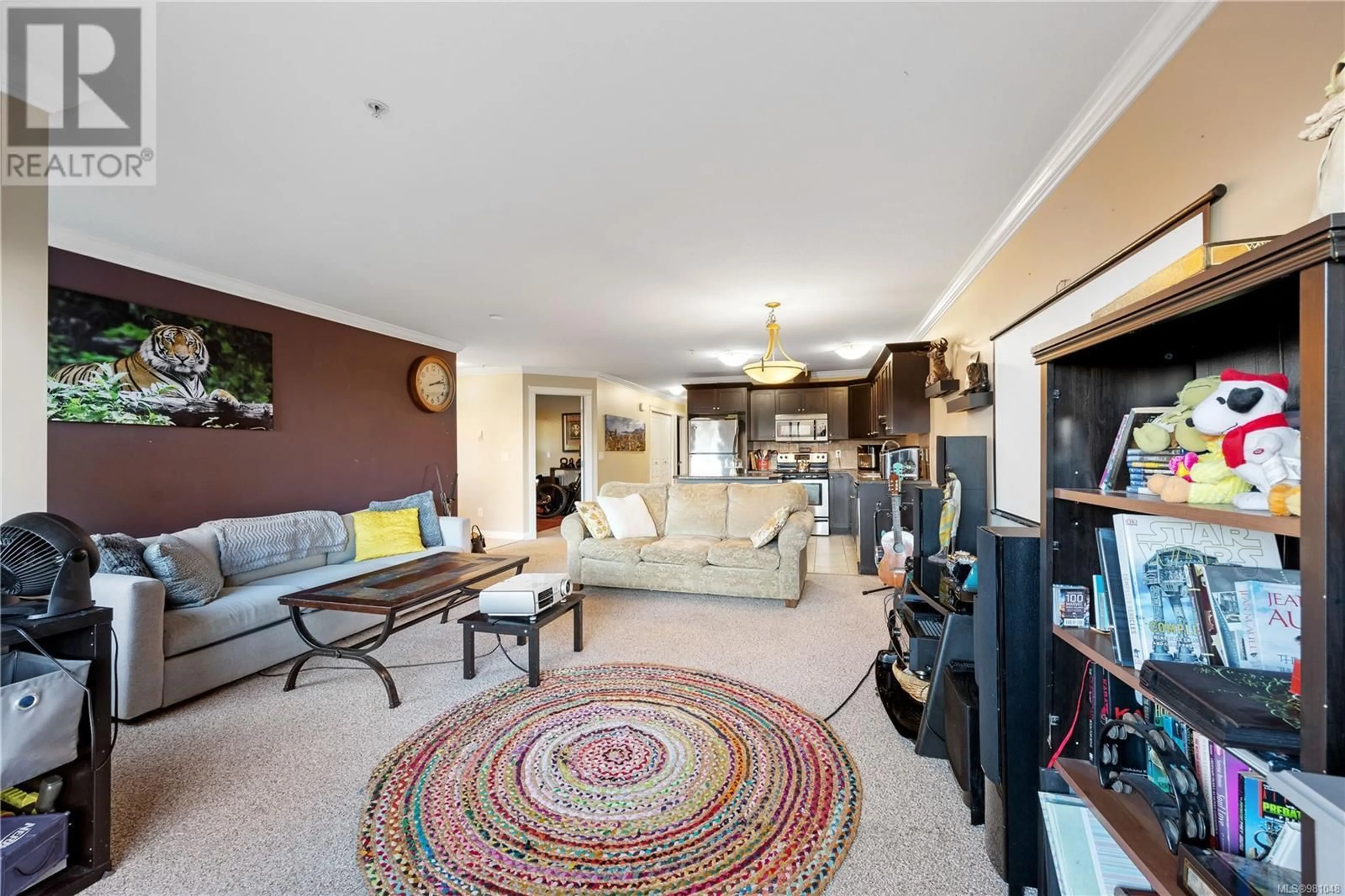 Living room, carpet floors for 101 6149 Washington Way, Nanaimo British Columbia V9T0A2