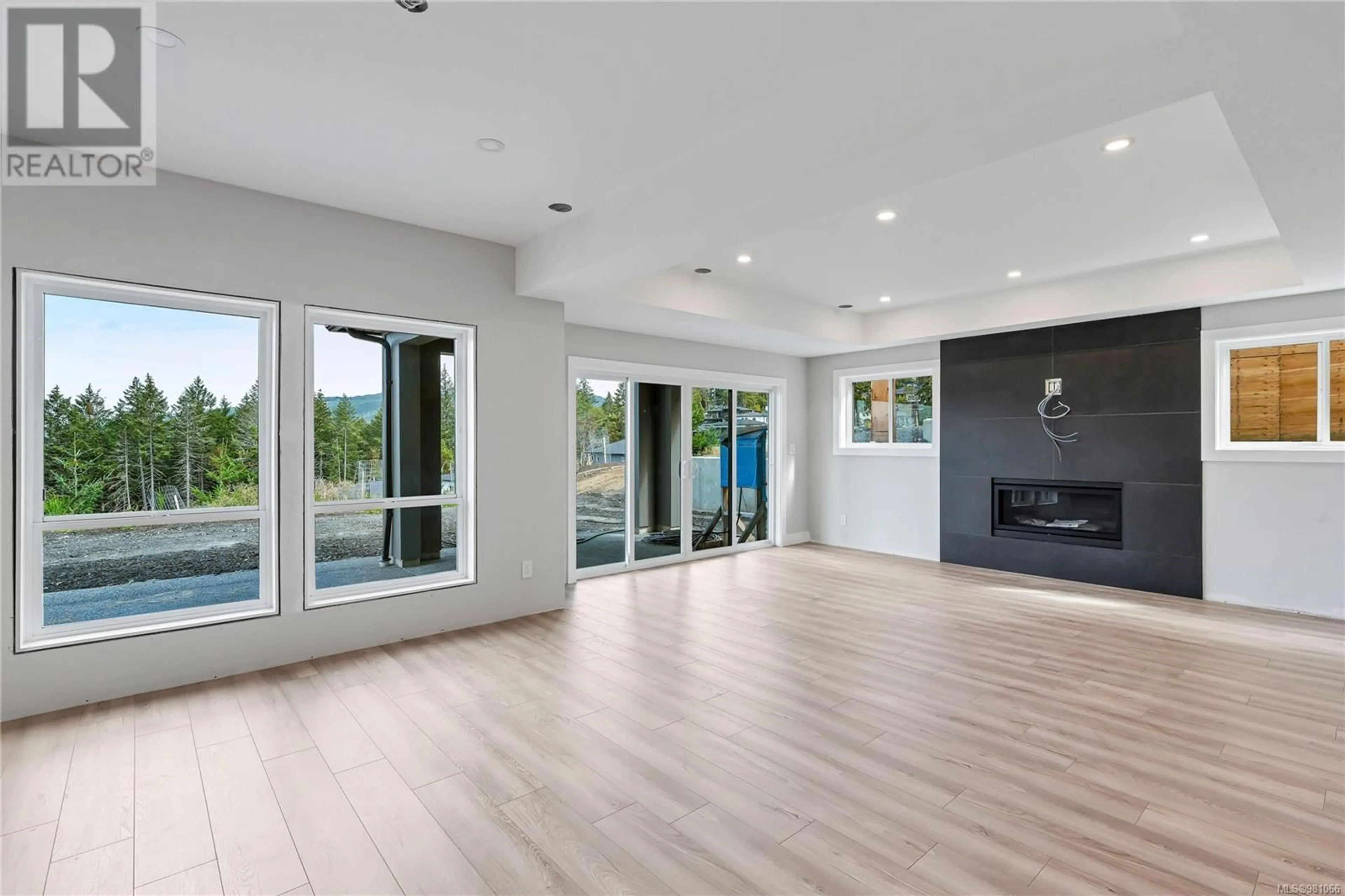 A pic of a room, wood floors for 3318 Woodrush Dr, Duncan British Columbia V1L0M5