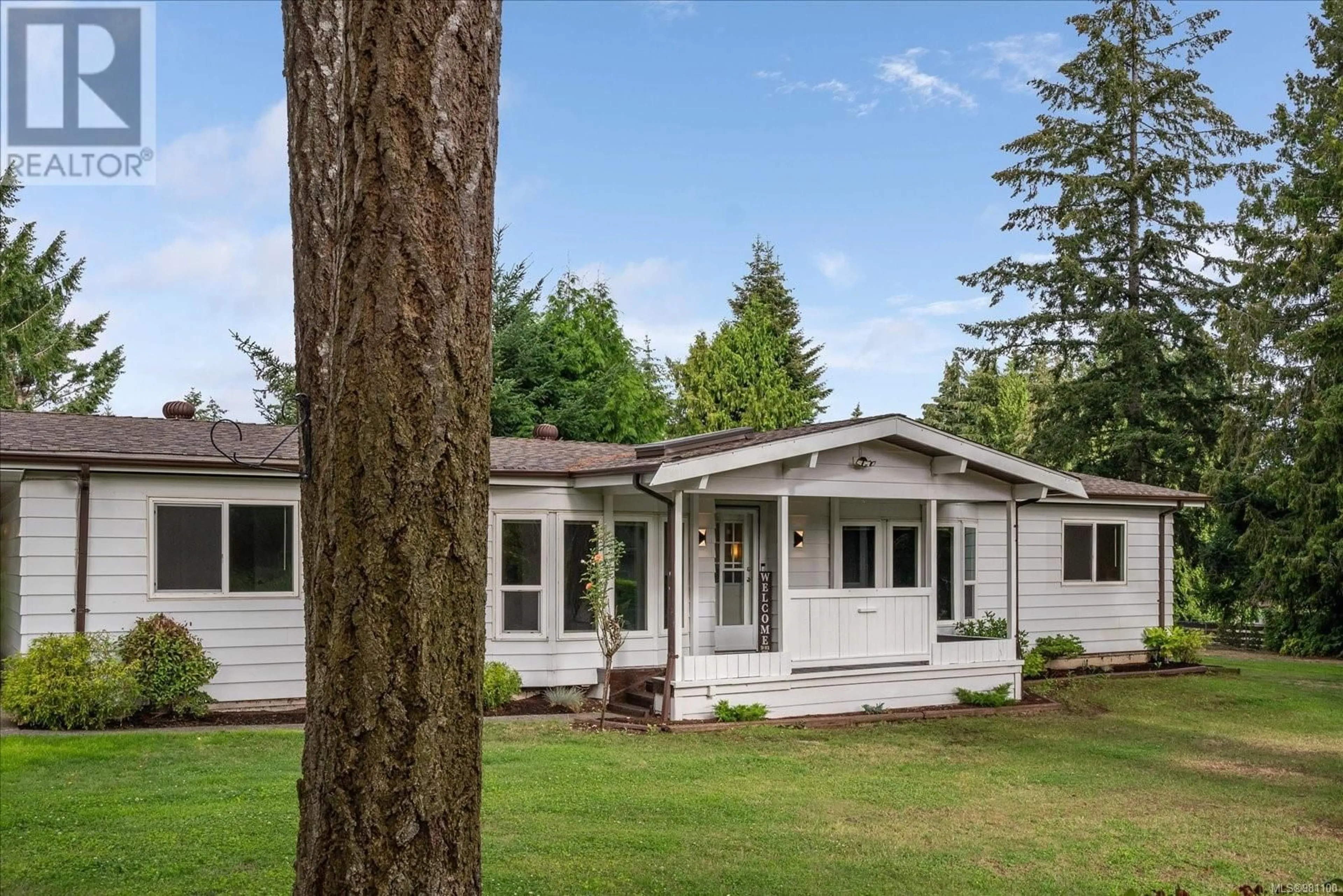 Frontside or backside of a home, cottage for 6913 Eastwind Dr, Lantzville British Columbia V0R2H0