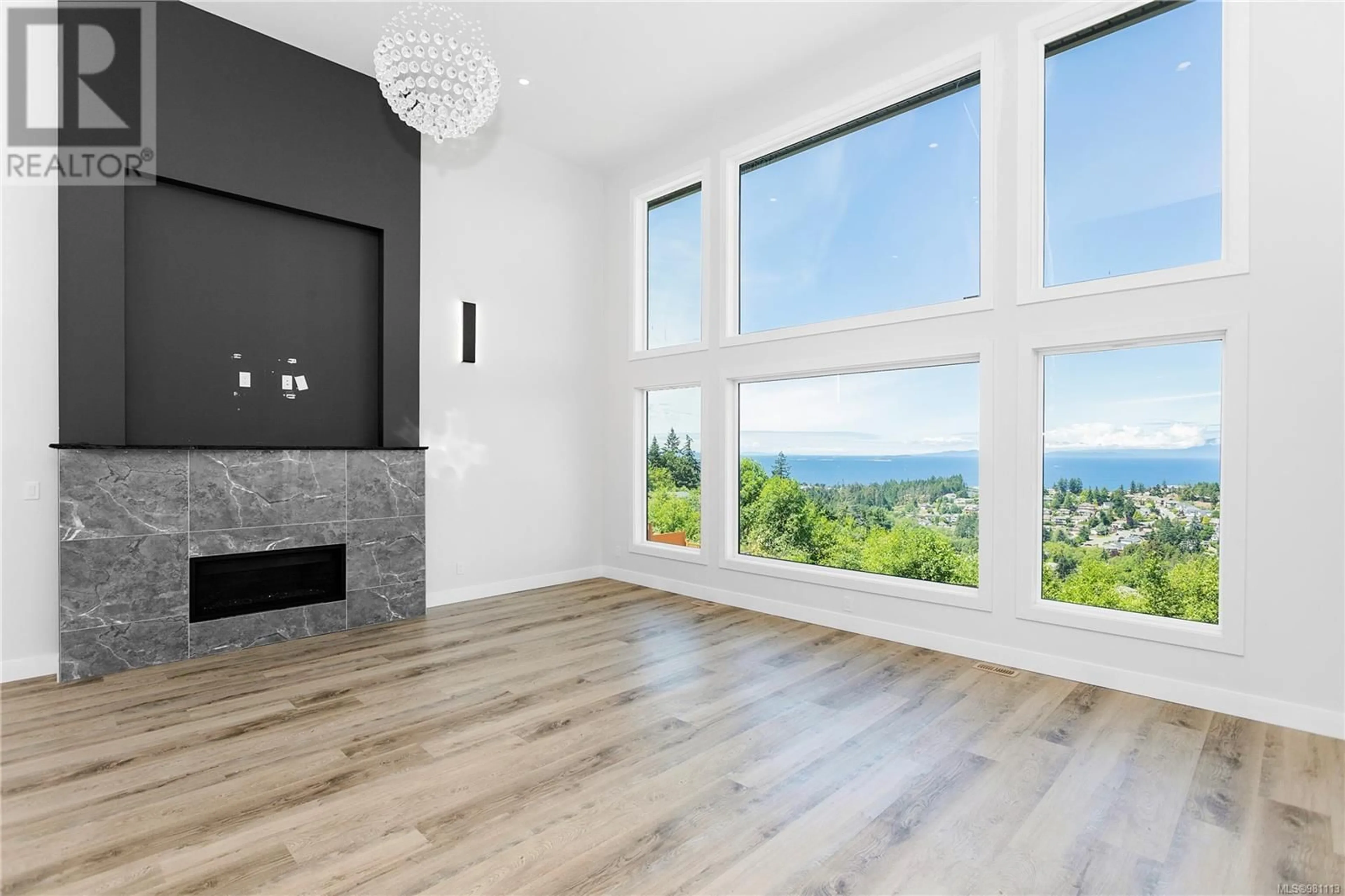 A pic of a room, wood floors for 100 Abalone Pl, Nanaimo British Columbia V9T0L3