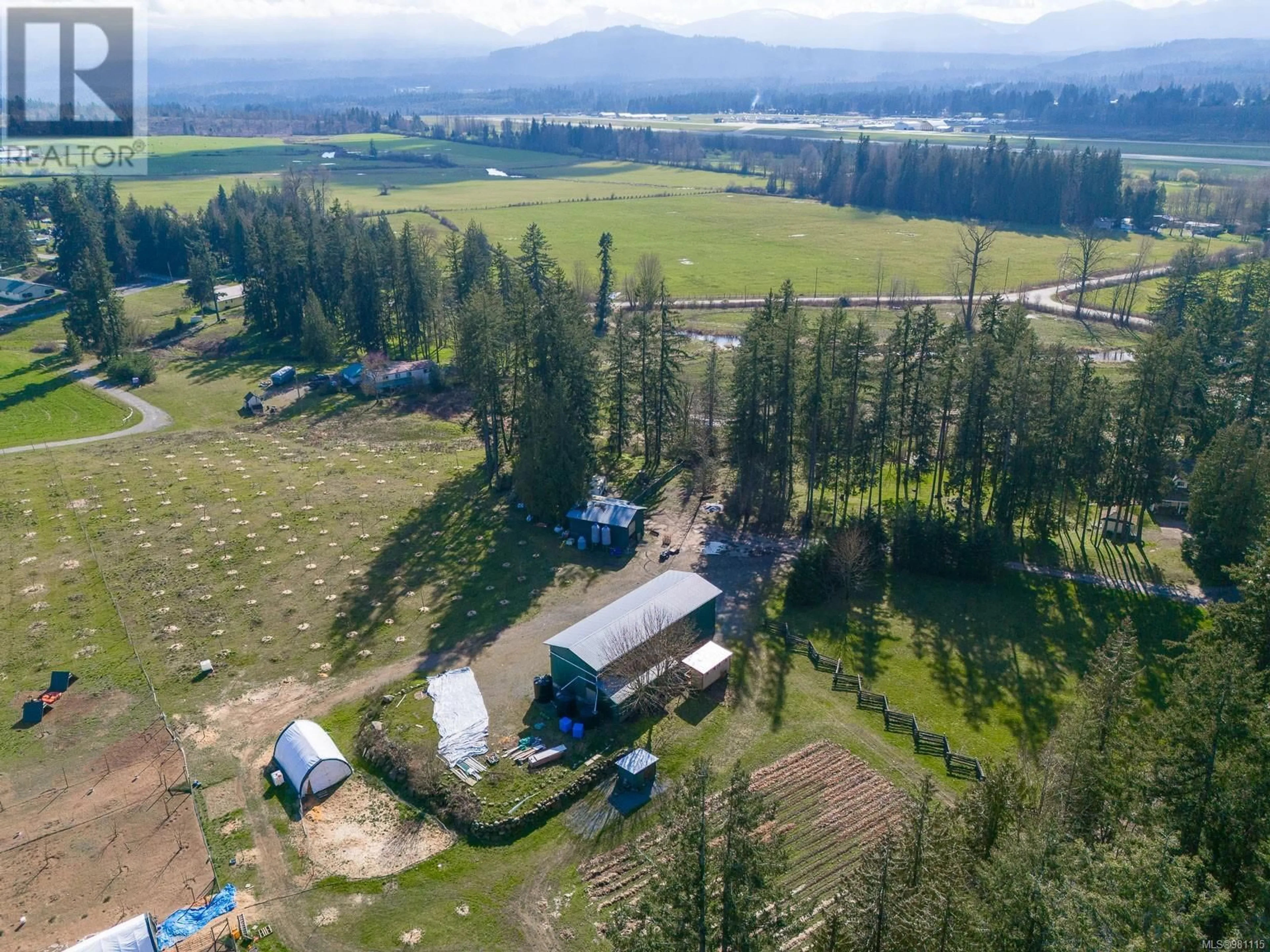A pic from outside/outdoor area/front of a property/back of a property/a pic from drone, mountain view for 2974 HASLAM ROAD, Nanaimo British Columbia V9X1T1