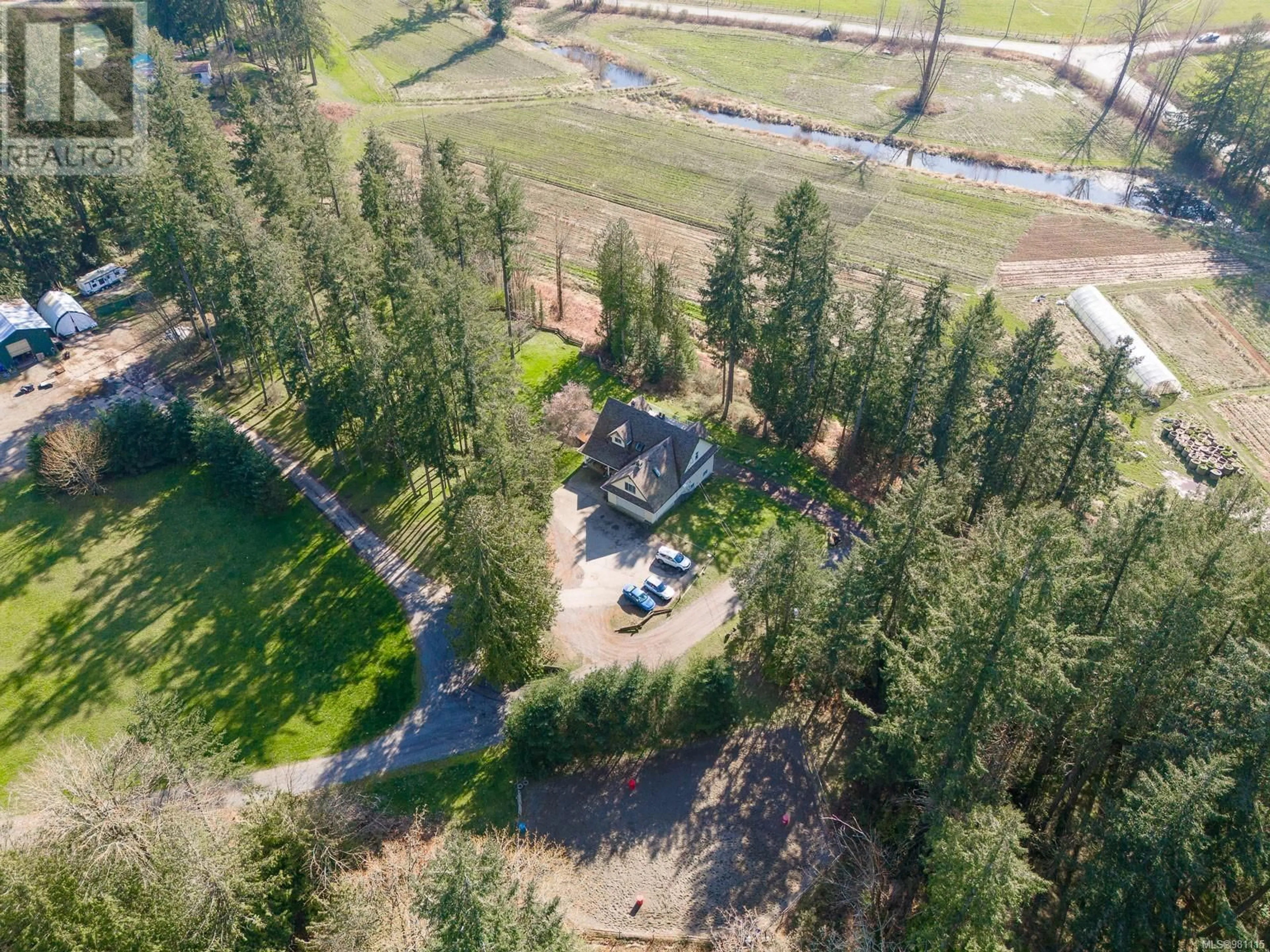 A pic from outside/outdoor area/front of a property/back of a property/a pic from drone, forest/trees view for 2974 HASLAM ROAD, Nanaimo British Columbia V9X1T1