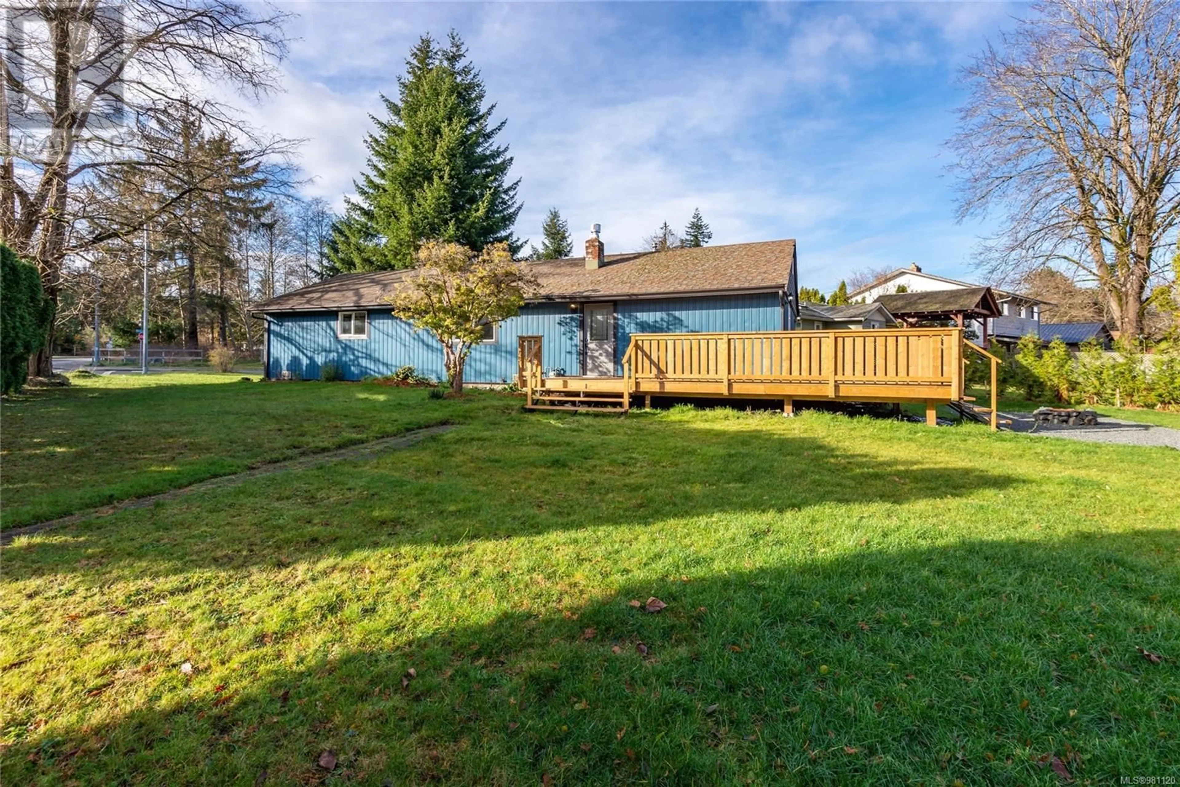 Frontside or backside of a home, the fenced backyard for 494 Hilchey Rd, Campbell River British Columbia V9W1R1