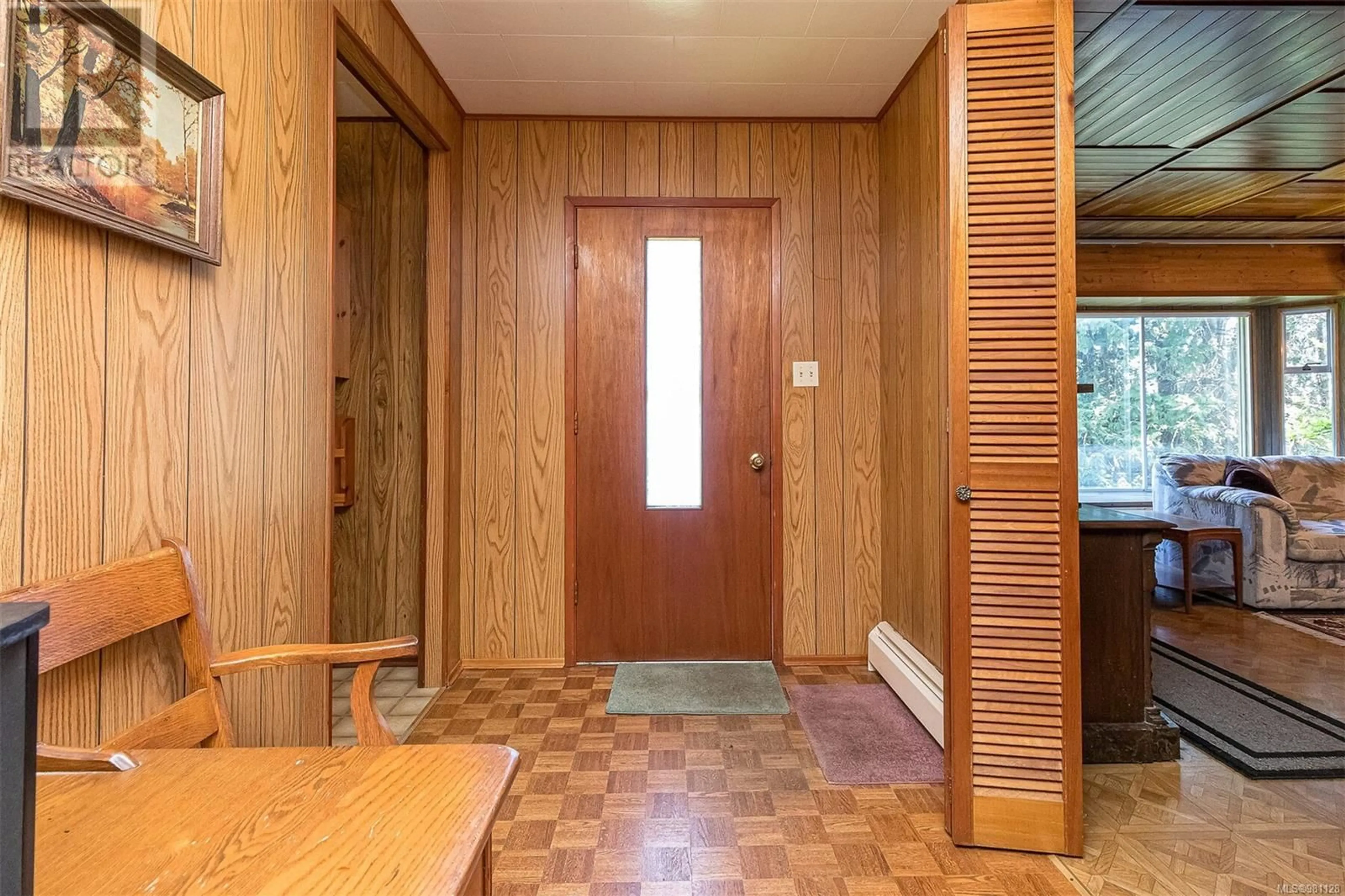 Indoor foyer, wood floors for 6896 Island Hwy W, Bowser British Columbia V0R1G0