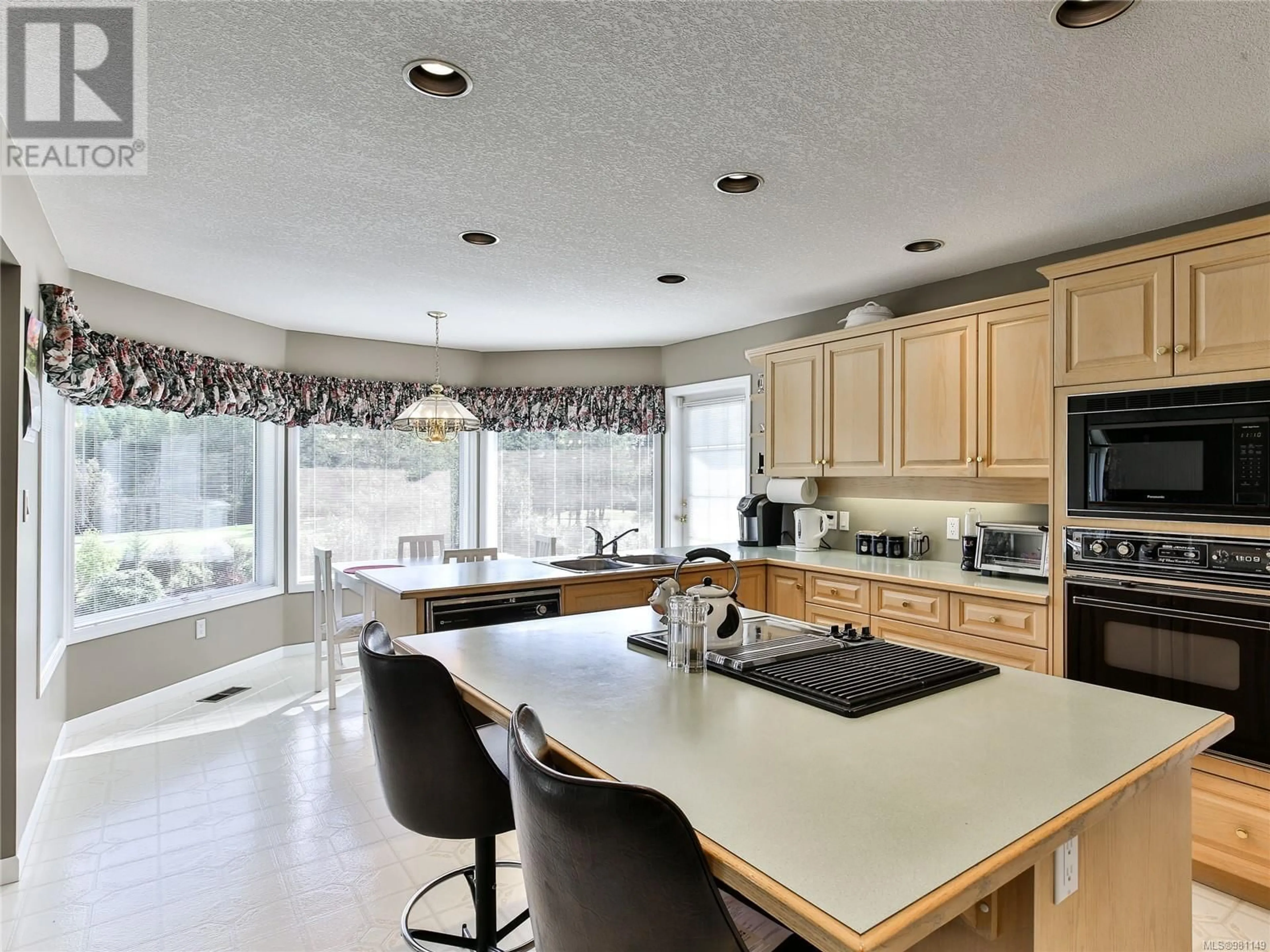 Open concept kitchen, ceramic/tile floor for 6333 Cherry Creek Rd, Port Alberni British Columbia V9Y8S9