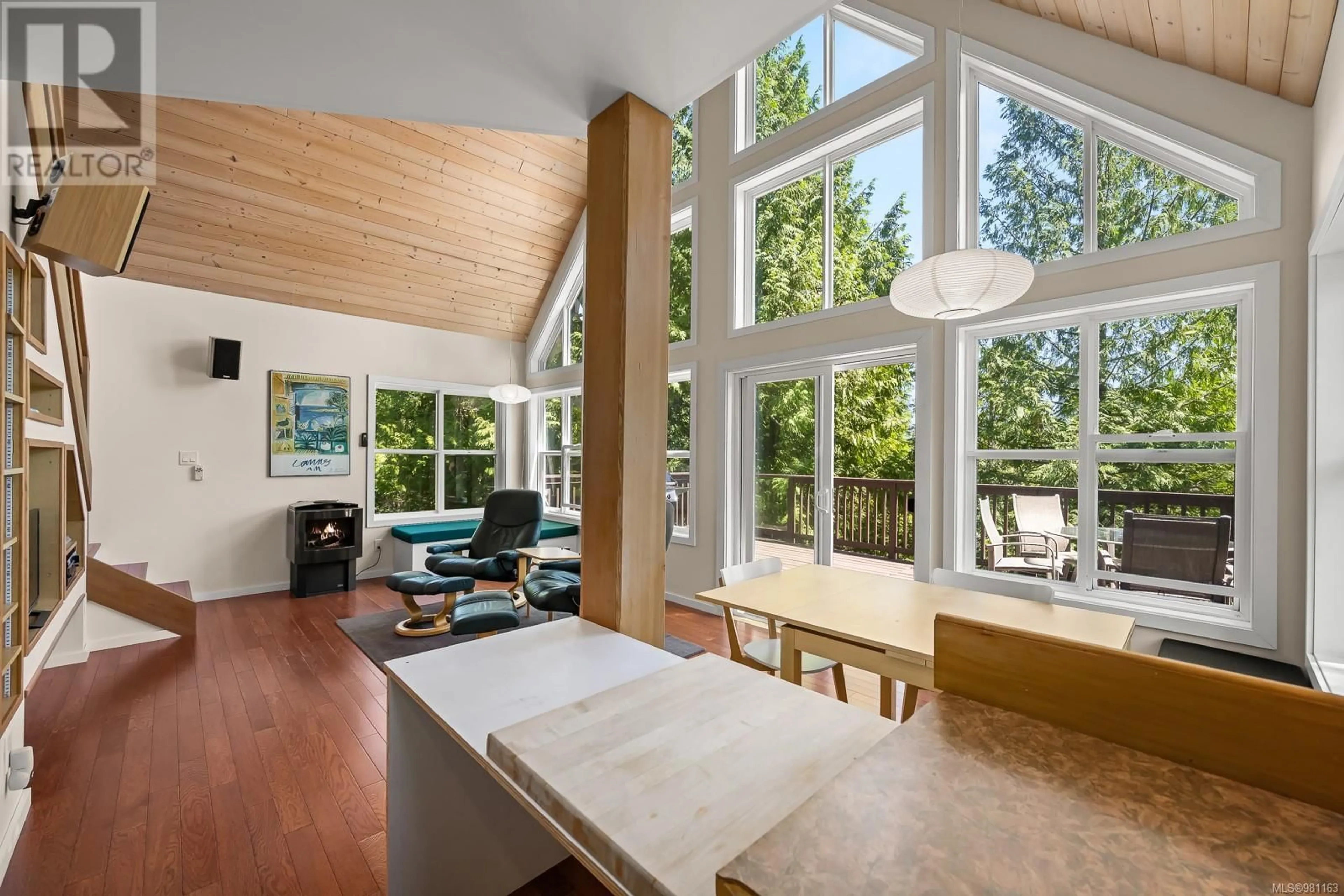 Open concept kitchen, wood/laminate floor for 264 YAKKA WAY, Cortes Island British Columbia V0P1Z0