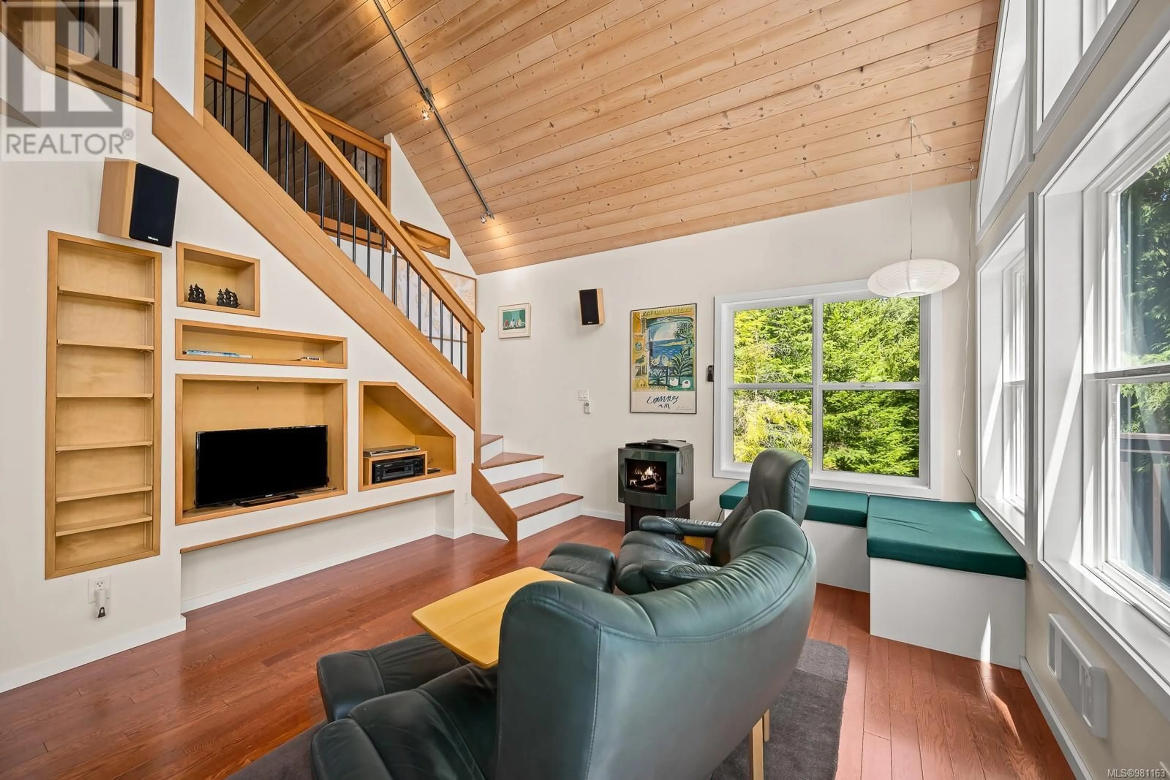 Open concept kitchen, wood/laminate floor for 264 YAKKA WAY, Cortes Island British Columbia V0P1Z0