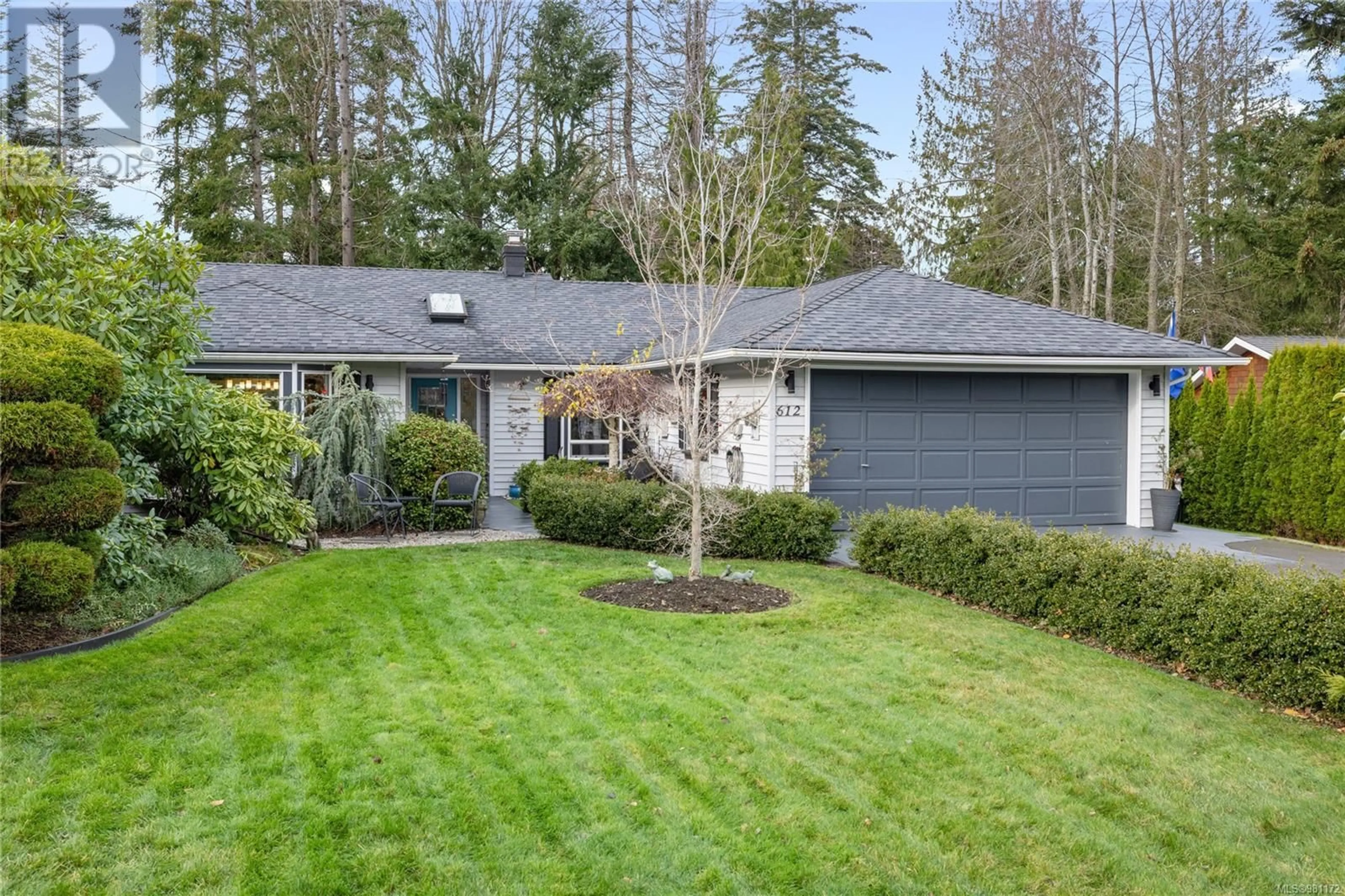 Frontside or backside of a home, cottage for 612 Nassau Cres, Qualicum Beach British Columbia V9K1C4