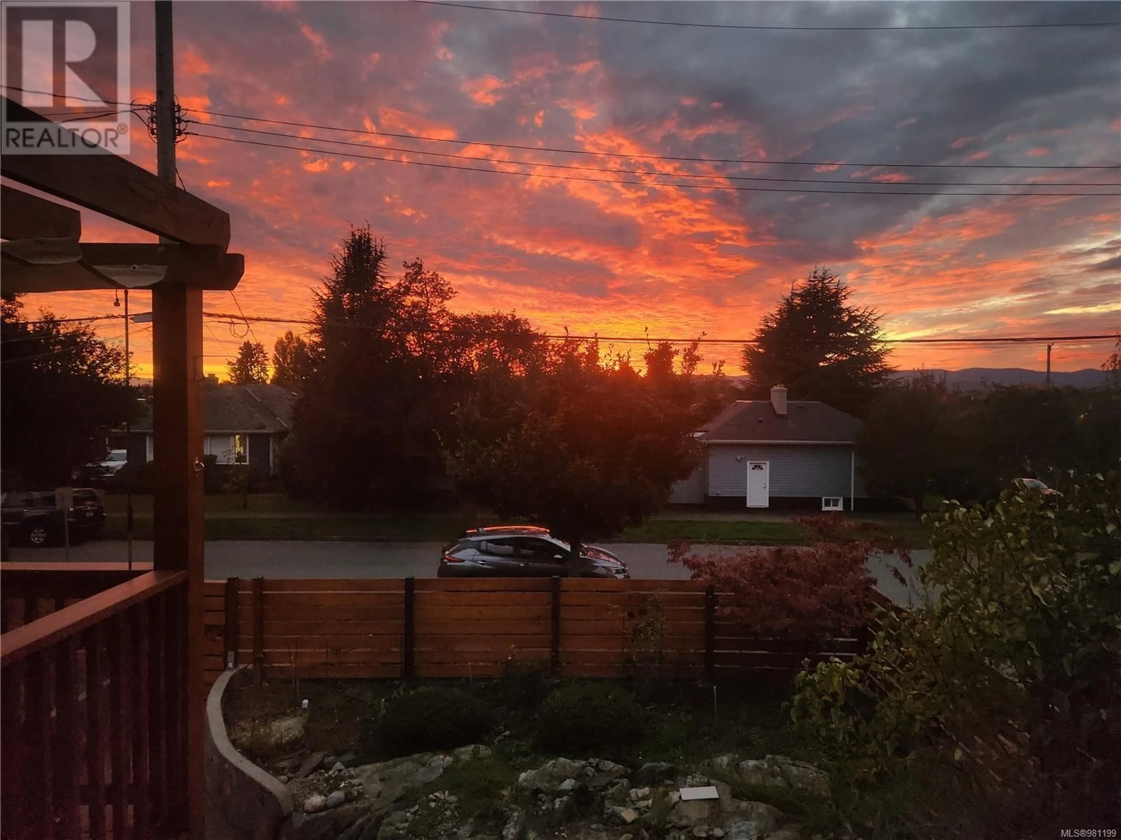 A pic from exterior of the house or condo, the fenced backyard for 3143 GLASGOW St, Victoria British Columbia V8X1L8