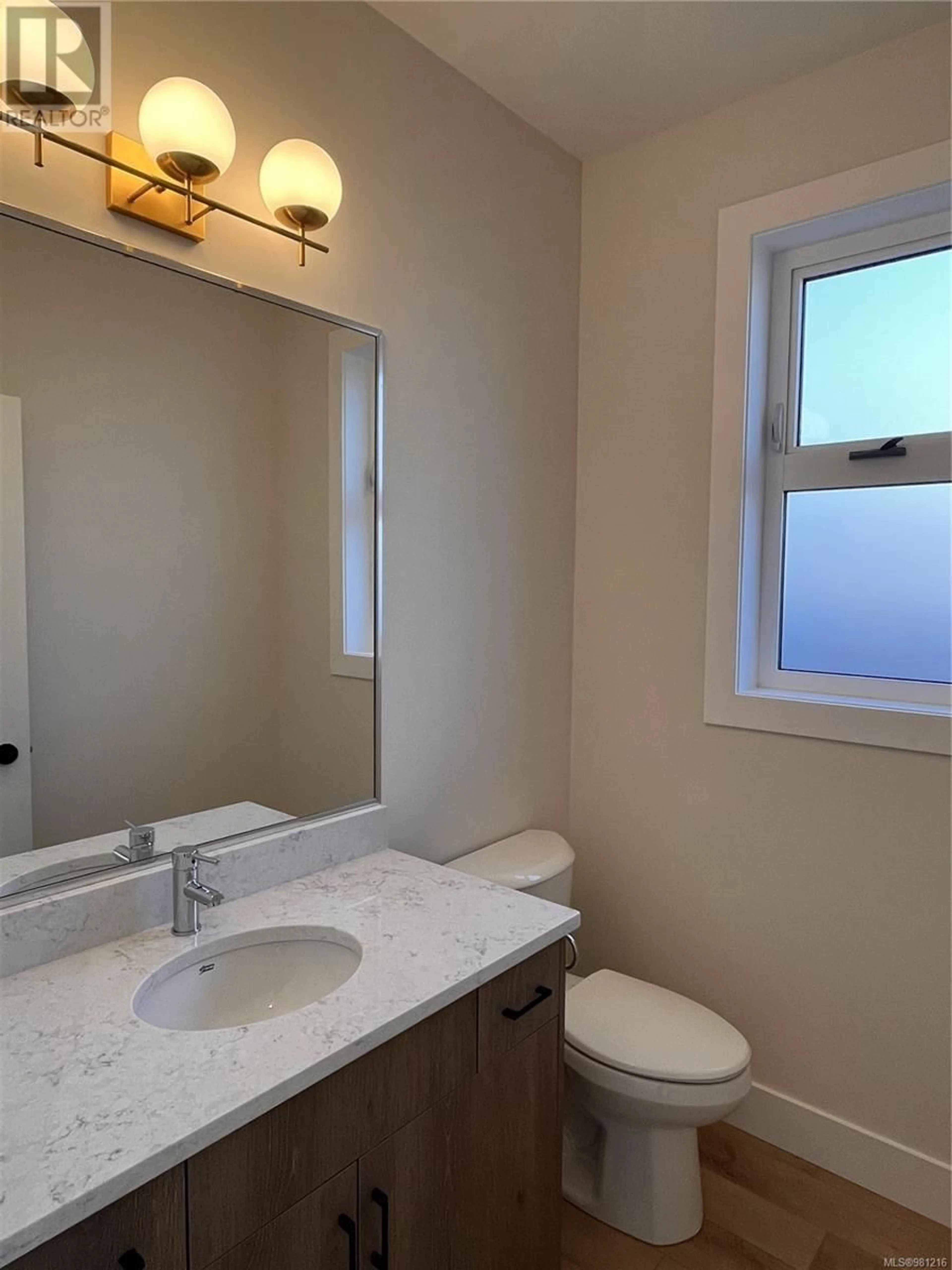 Standard bathroom, wood floors for 653 Hoffman Ave, Langford British Columbia V9B3A6