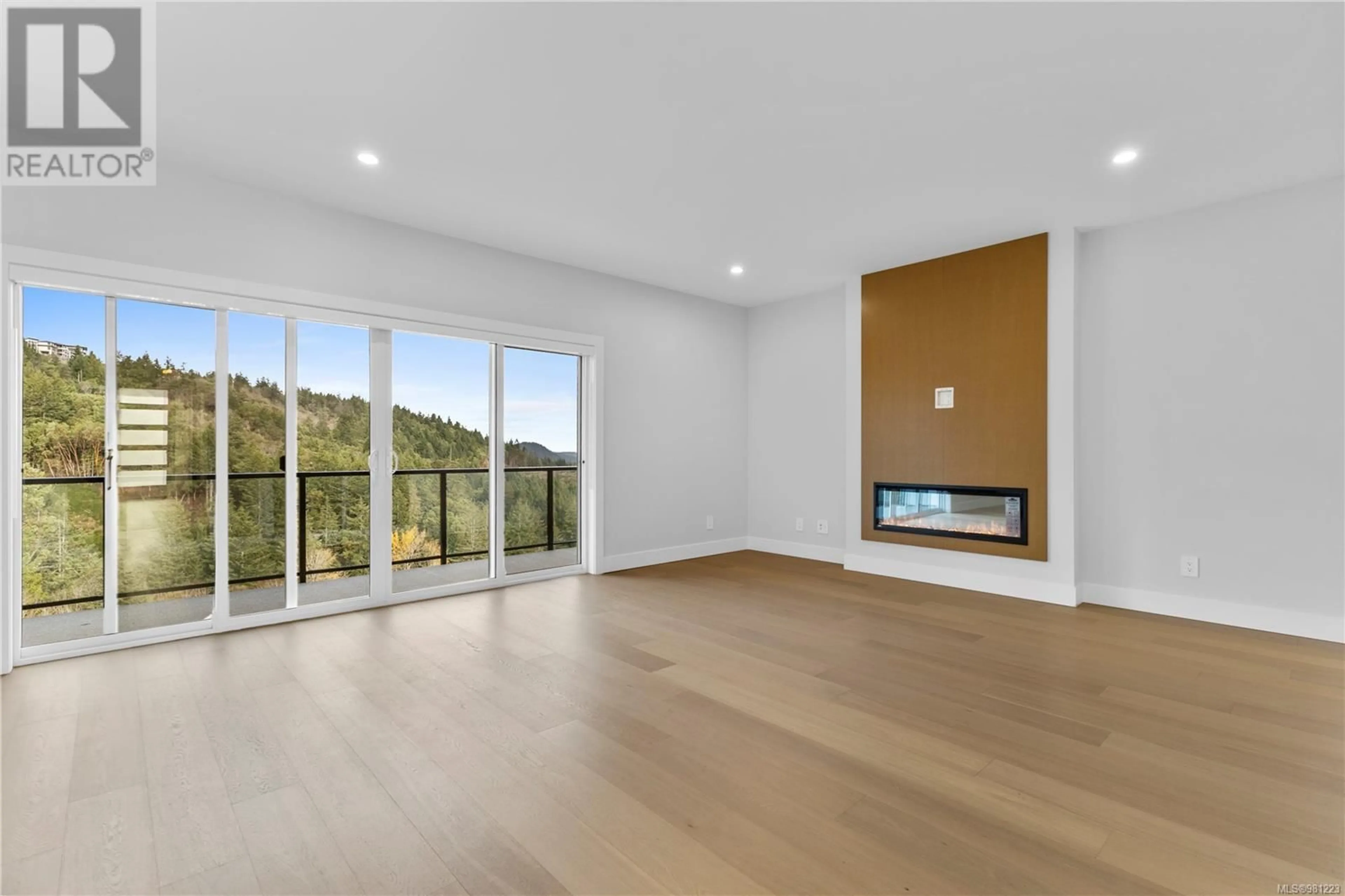 A pic of a room, wood floors for 1406 Sandstone Lane, Langford British Columbia V9B7A2