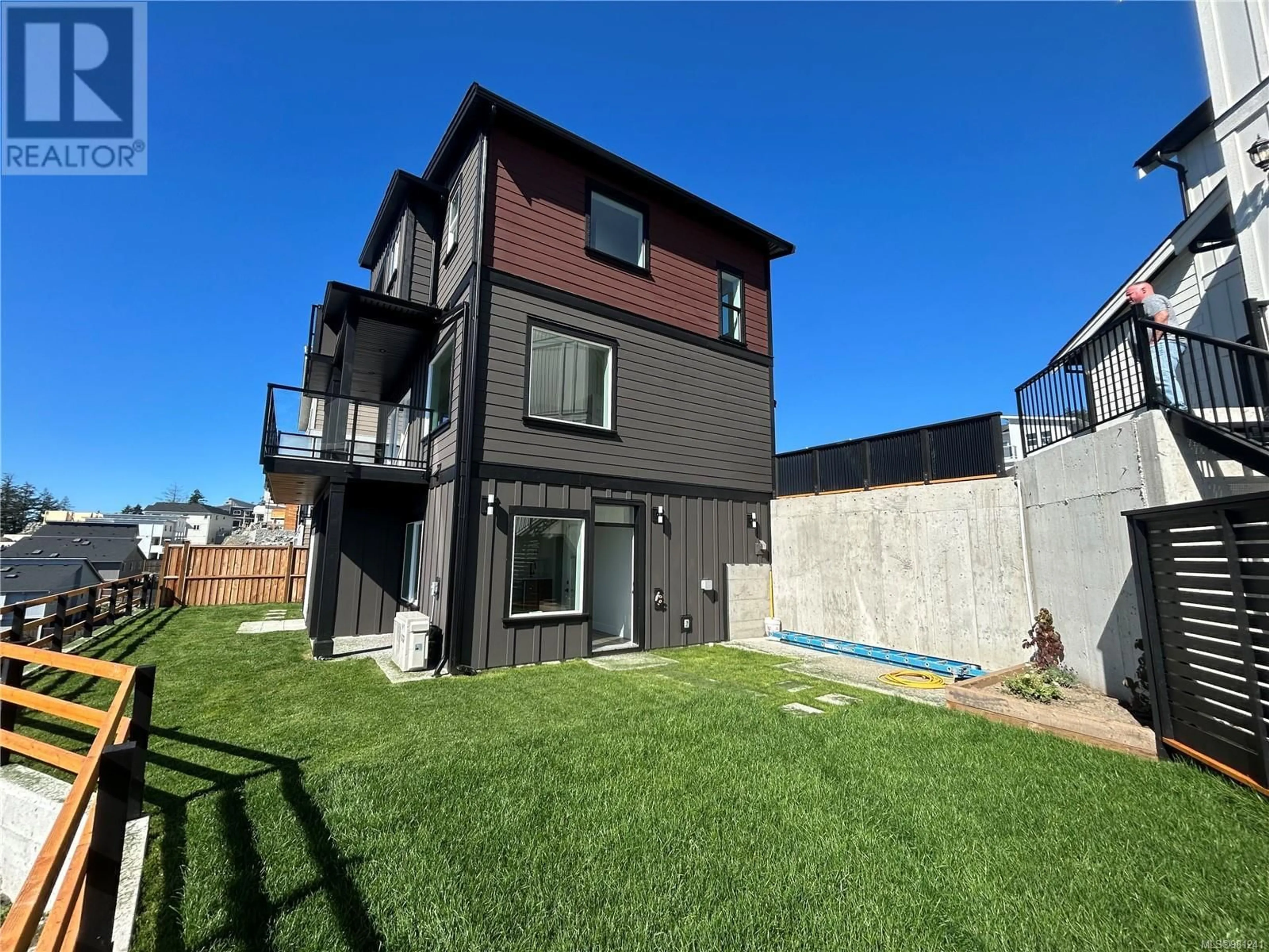 Frontside or backside of a home, the fenced backyard for 2315 Hudson Terr, Sooke British Columbia V9Z1R2