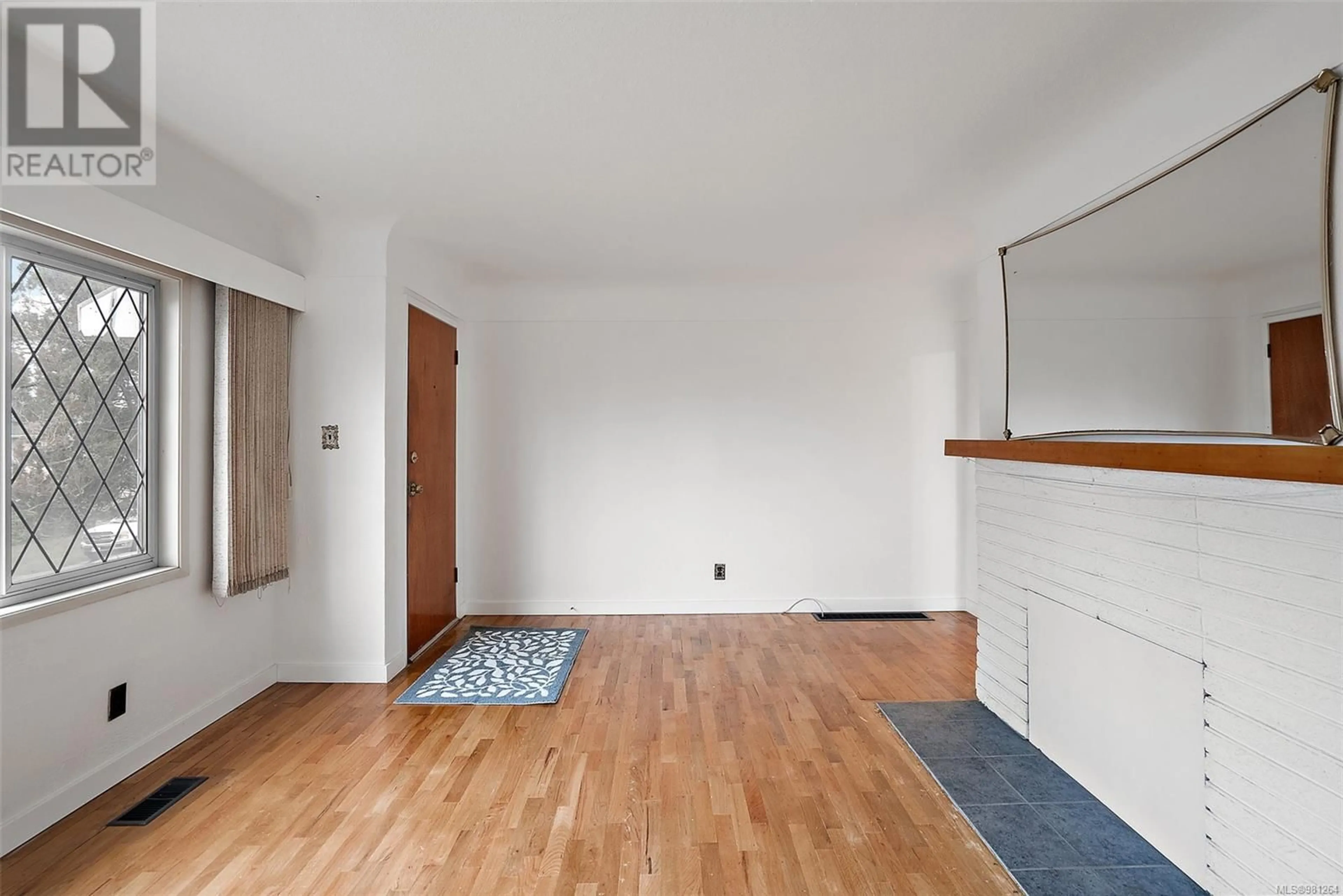 A pic of a room, wood floors for 590 OConnell Pl, Saanich British Columbia V8Z2C4