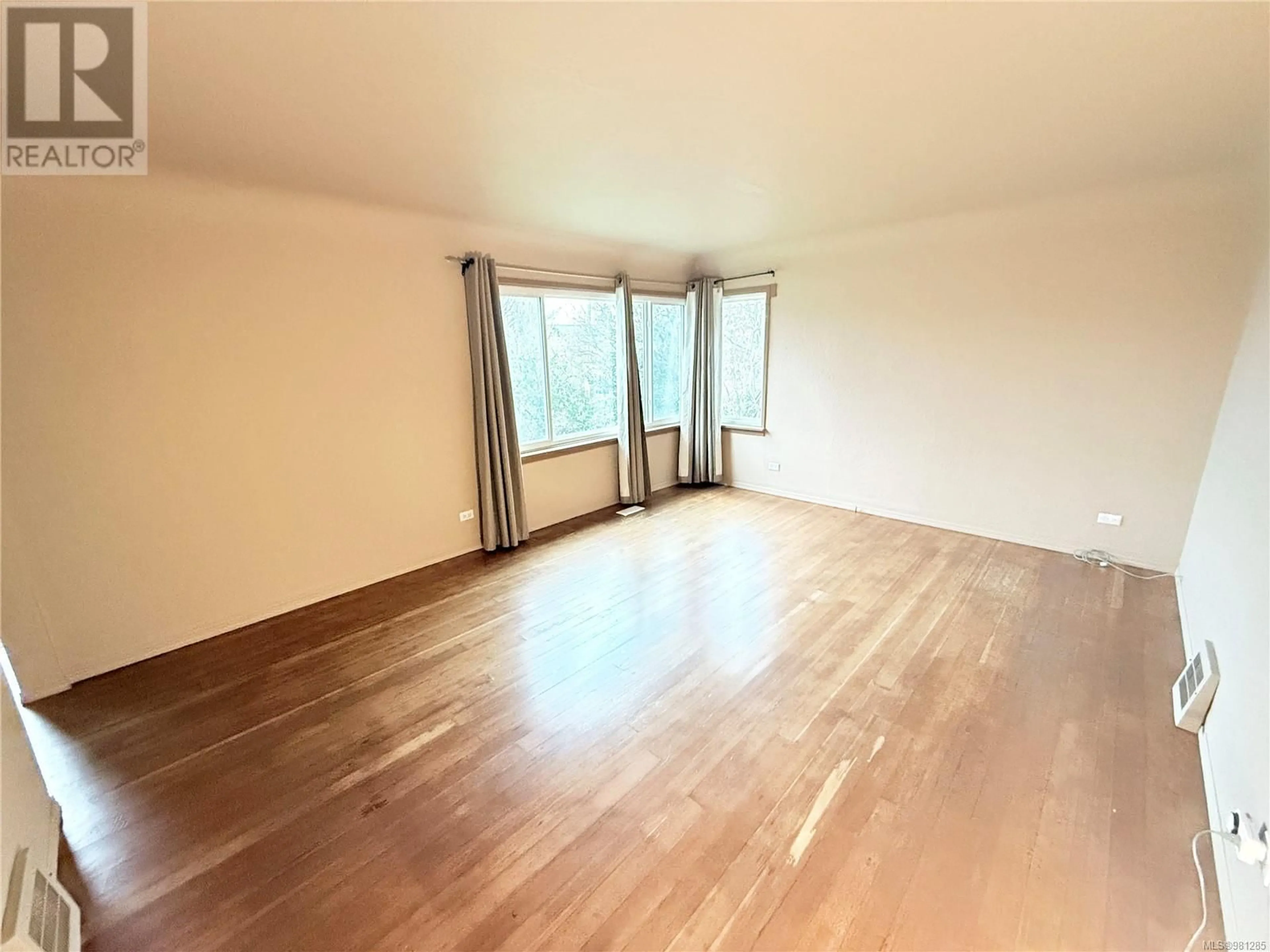 A pic of a room, wood floors for 537 Kennedy St, Nanaimo British Columbia V9R2J7