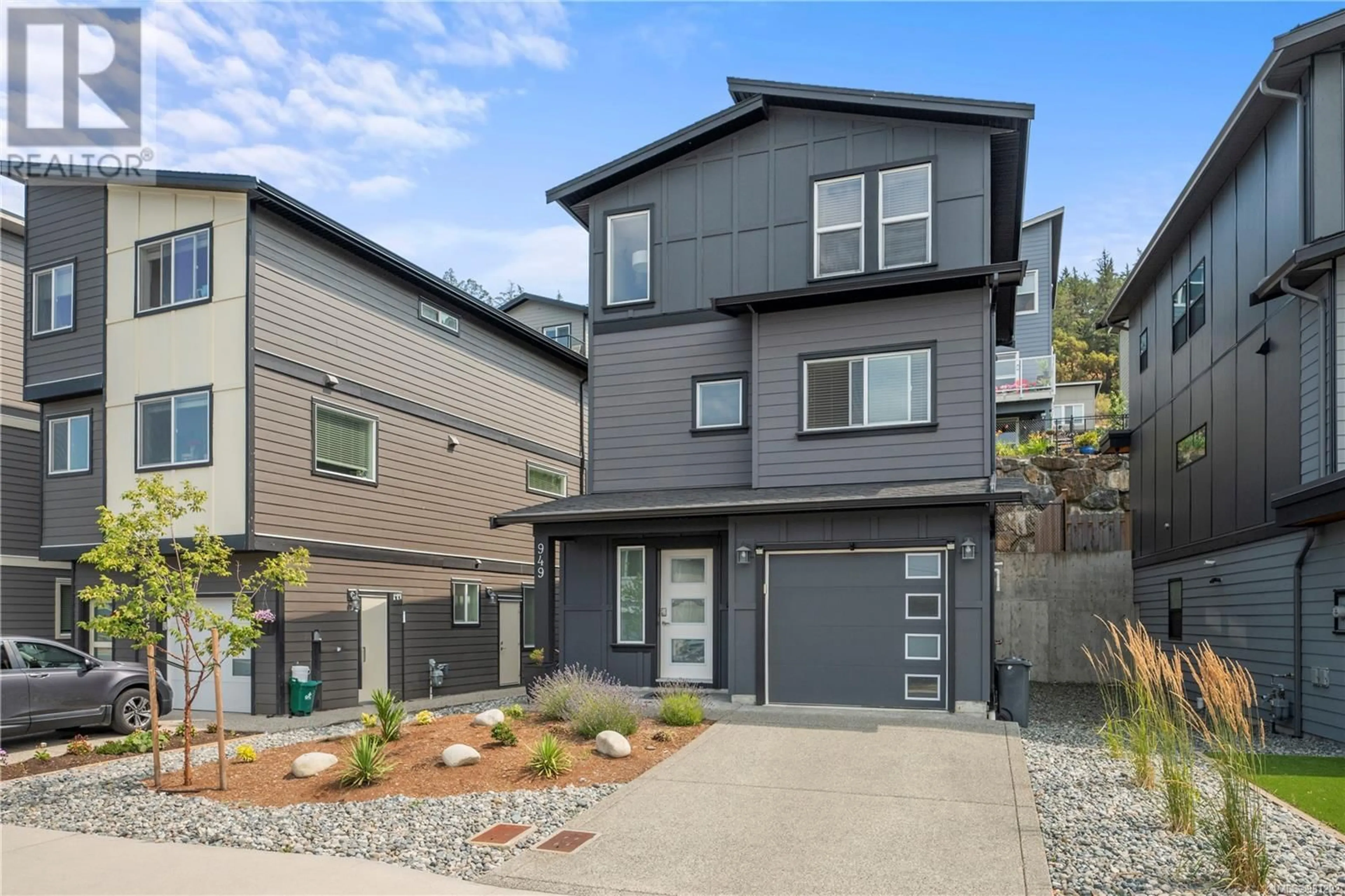 Frontside or backside of a home, the fenced backyard for 949 Peace Keeping Cres, Langford British Columbia V9C0N6