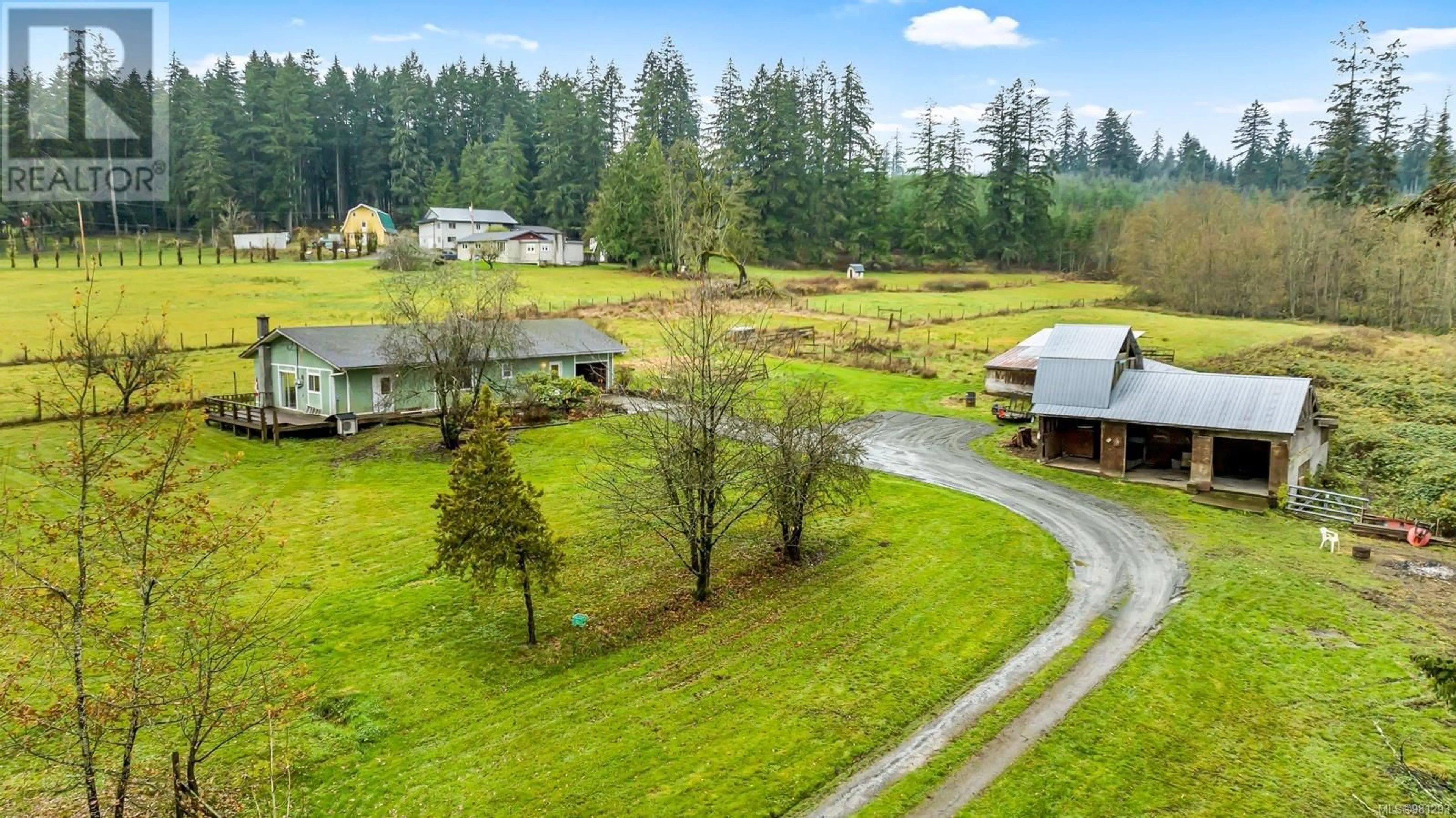 Frontside or backside of a home, the fenced backyard for 2915 Jackson Rd, Duncan British Columbia V9L6N7