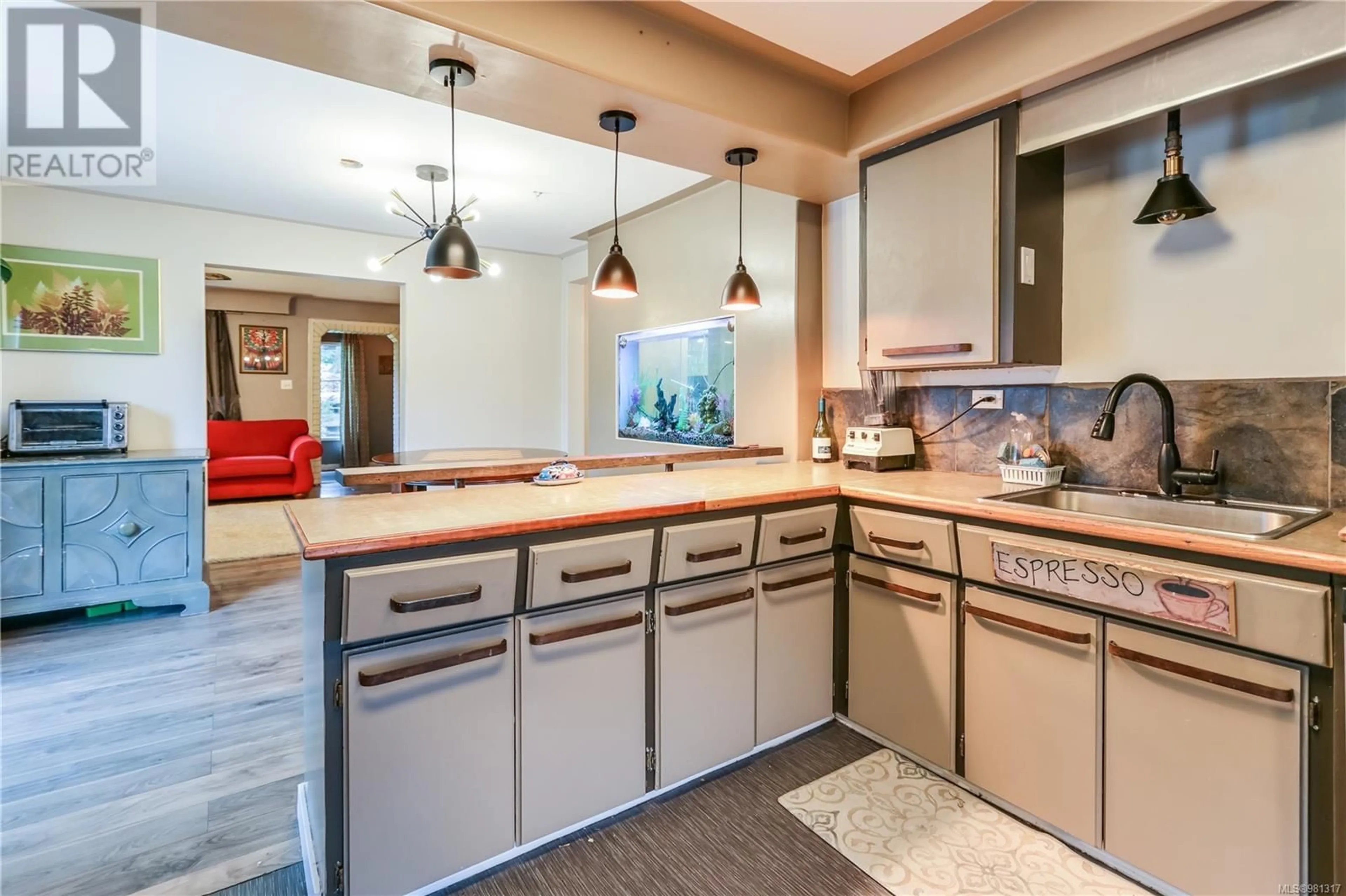 Open concept kitchen for 3480 Hammond Bay Rd, Nanaimo British Columbia V9T1E6