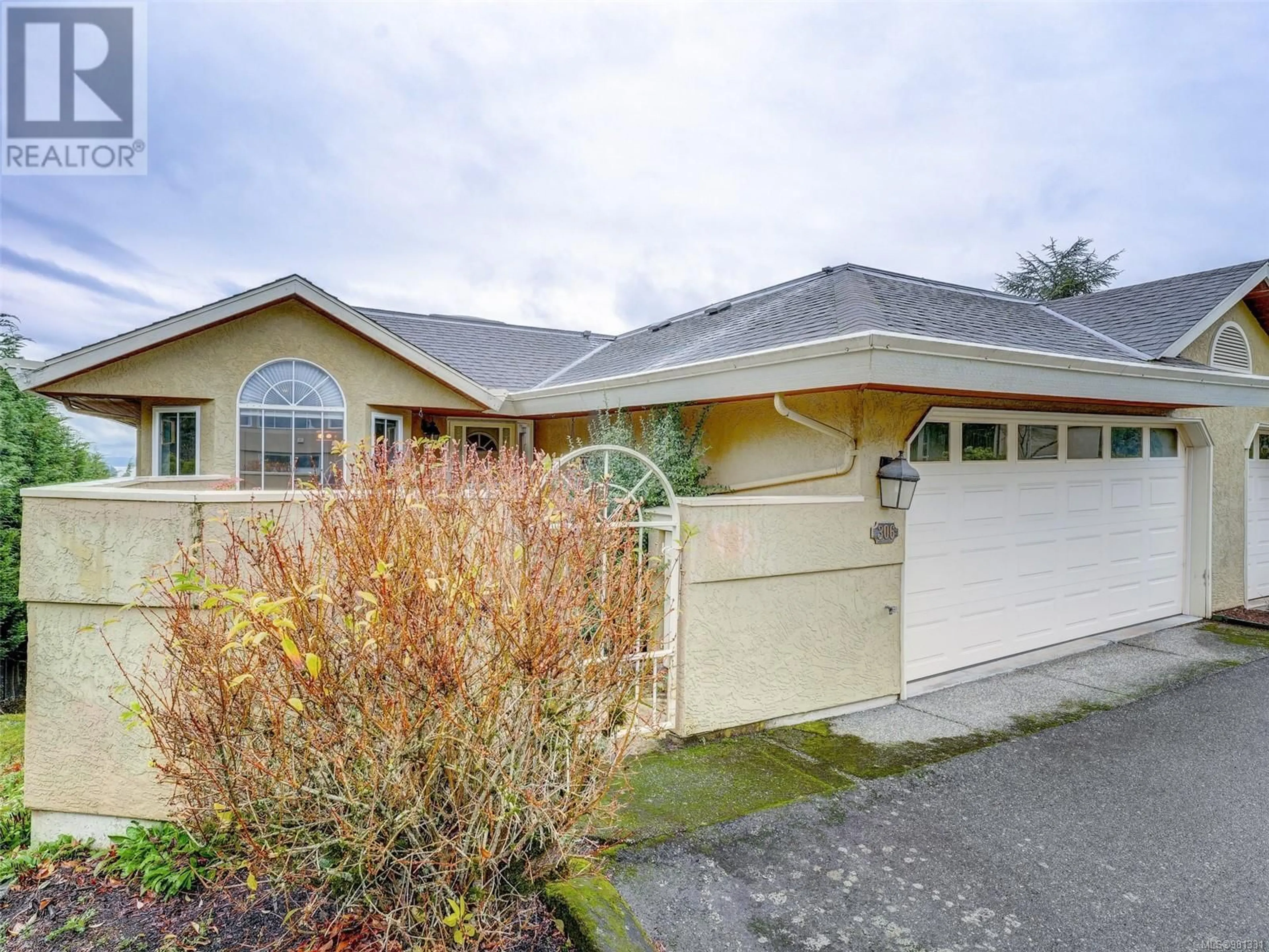 Frontside or backside of a home, cottage for 306 6880 Wallace Dr, Central Saanich British Columbia V8M1N8