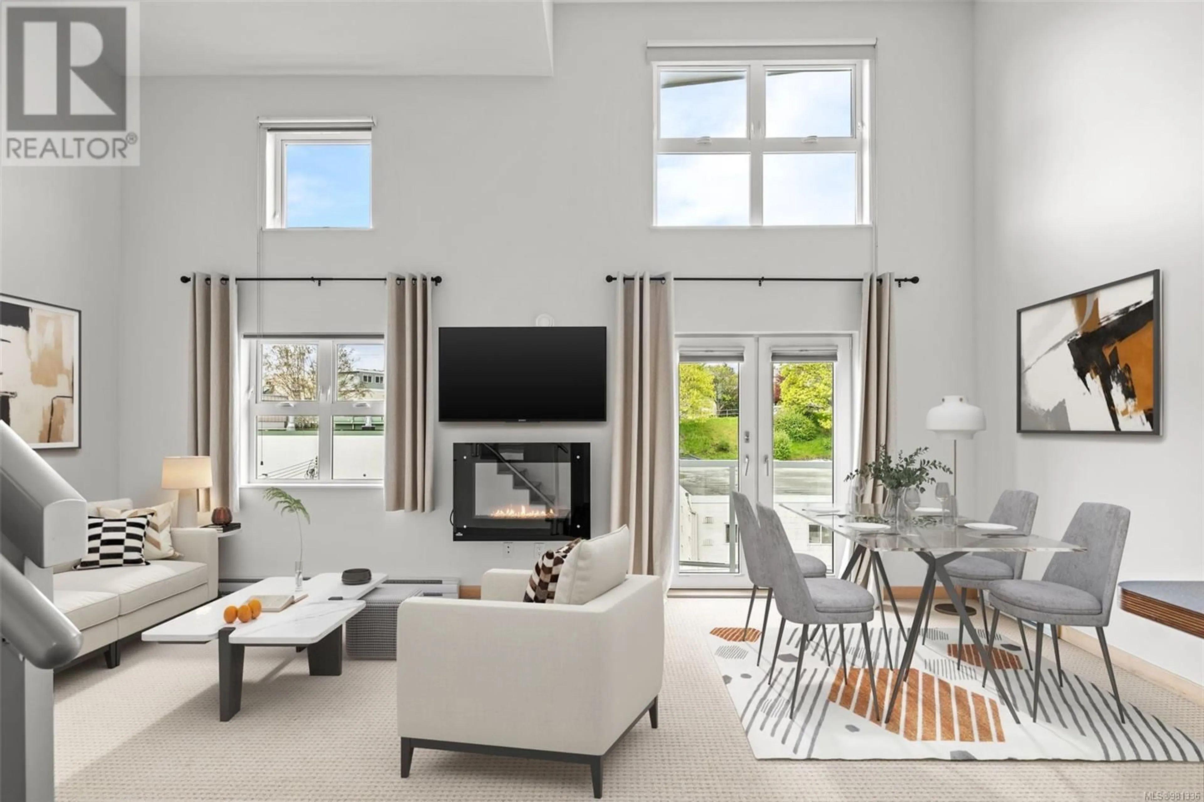 Living room, wood floors for 402 787 Tyee Rd, Victoria British Columbia V9A7R5