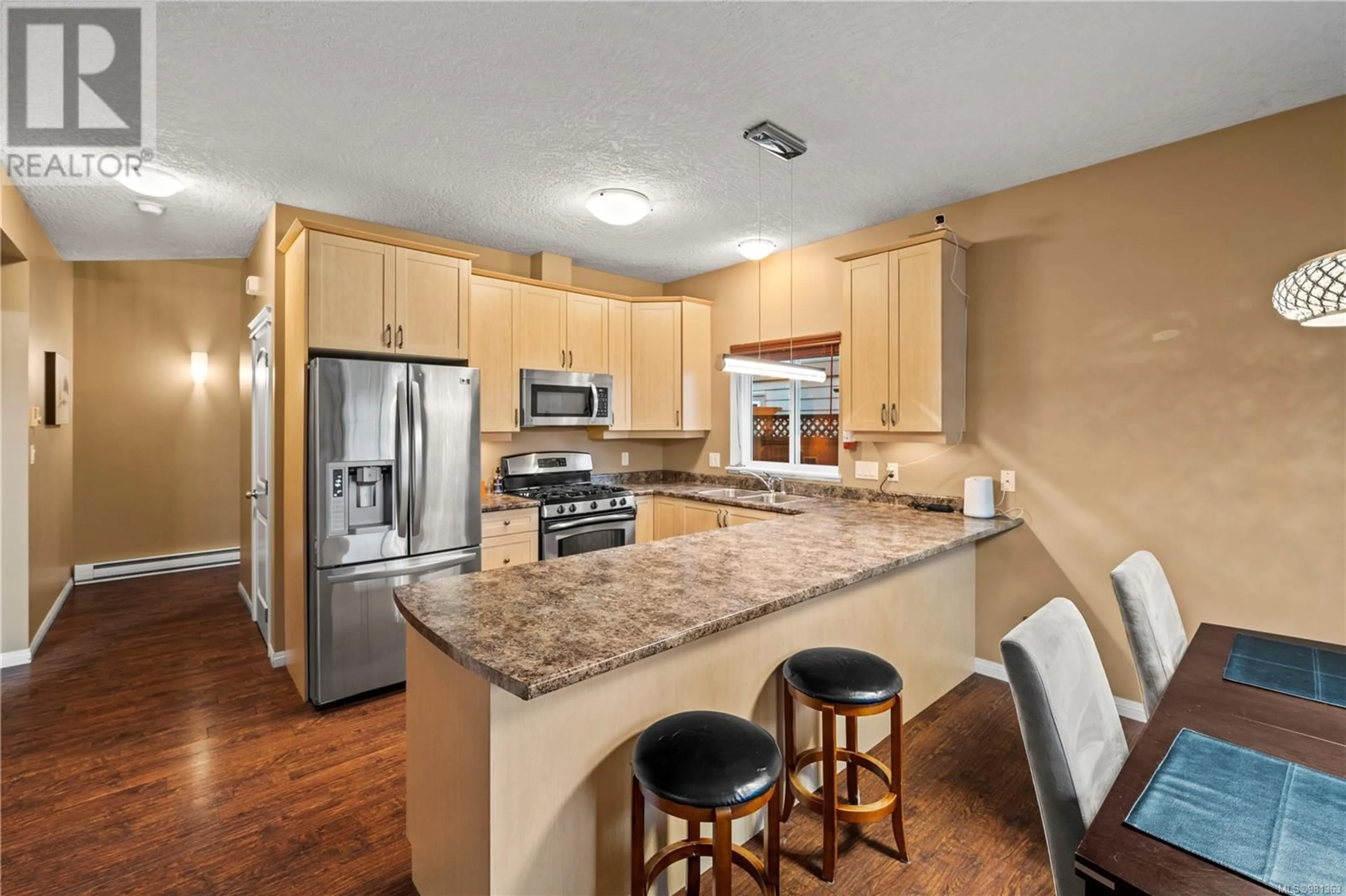 Open concept kitchen for 3402 Turnstone Dr, Langford British Columbia V9C0B4