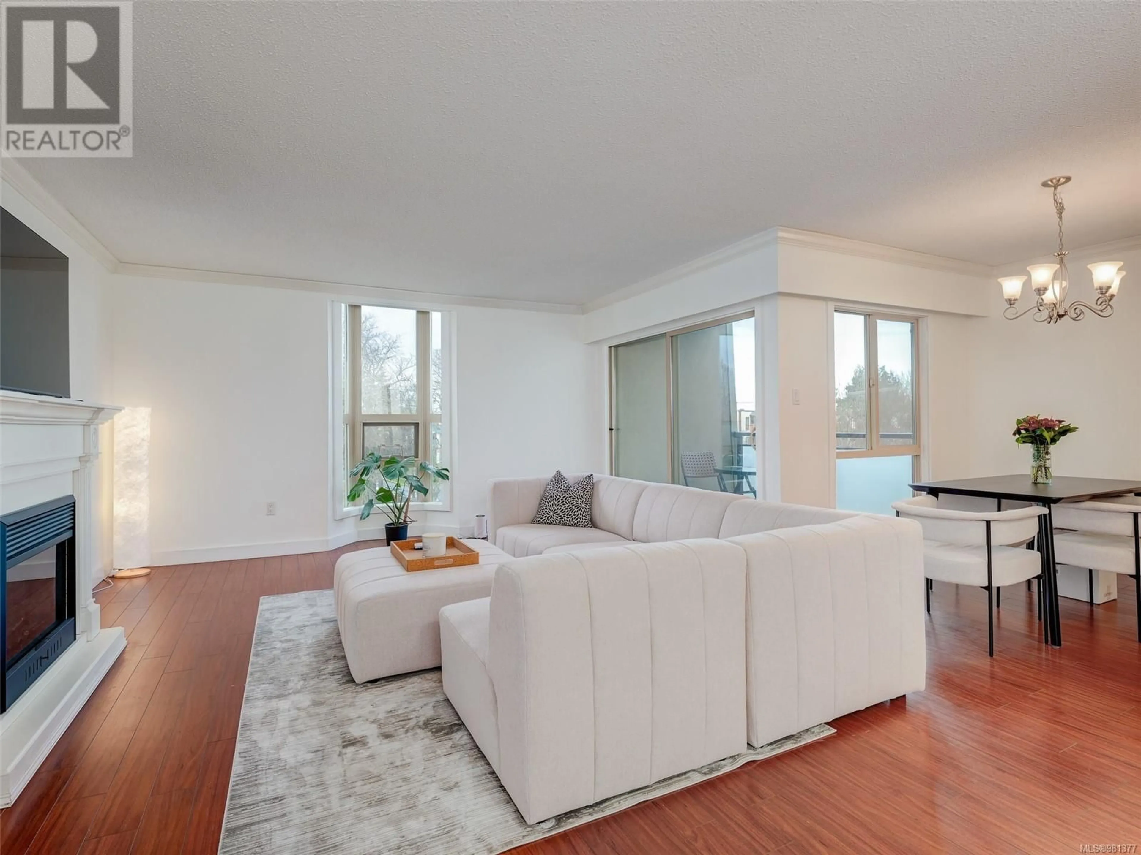 Living room, wood floors for 305 1545 Pandora Ave, Victoria British Columbia V8R6R1