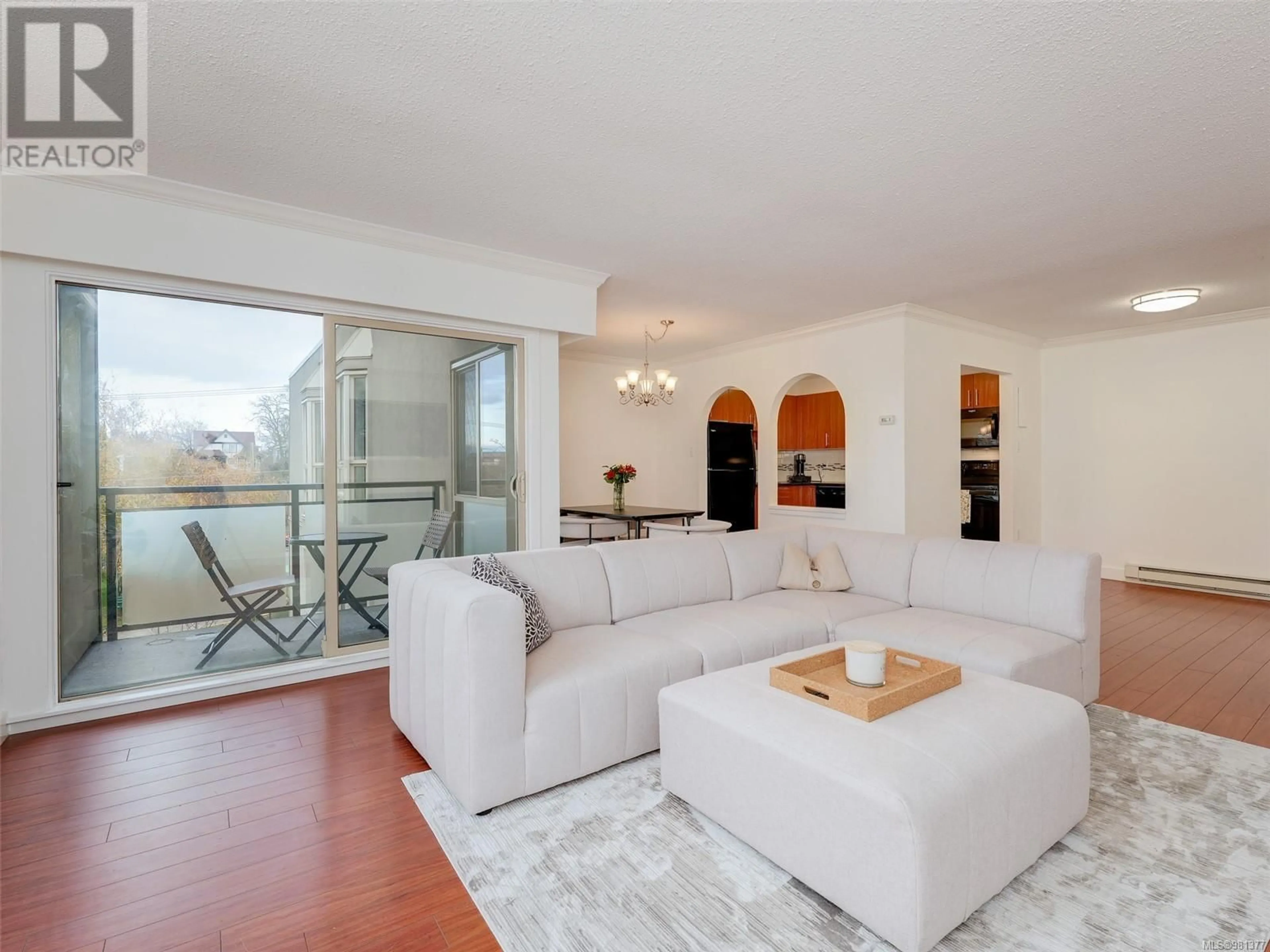 Living room, wood floors for 305 1545 Pandora Ave, Victoria British Columbia V8R6R1