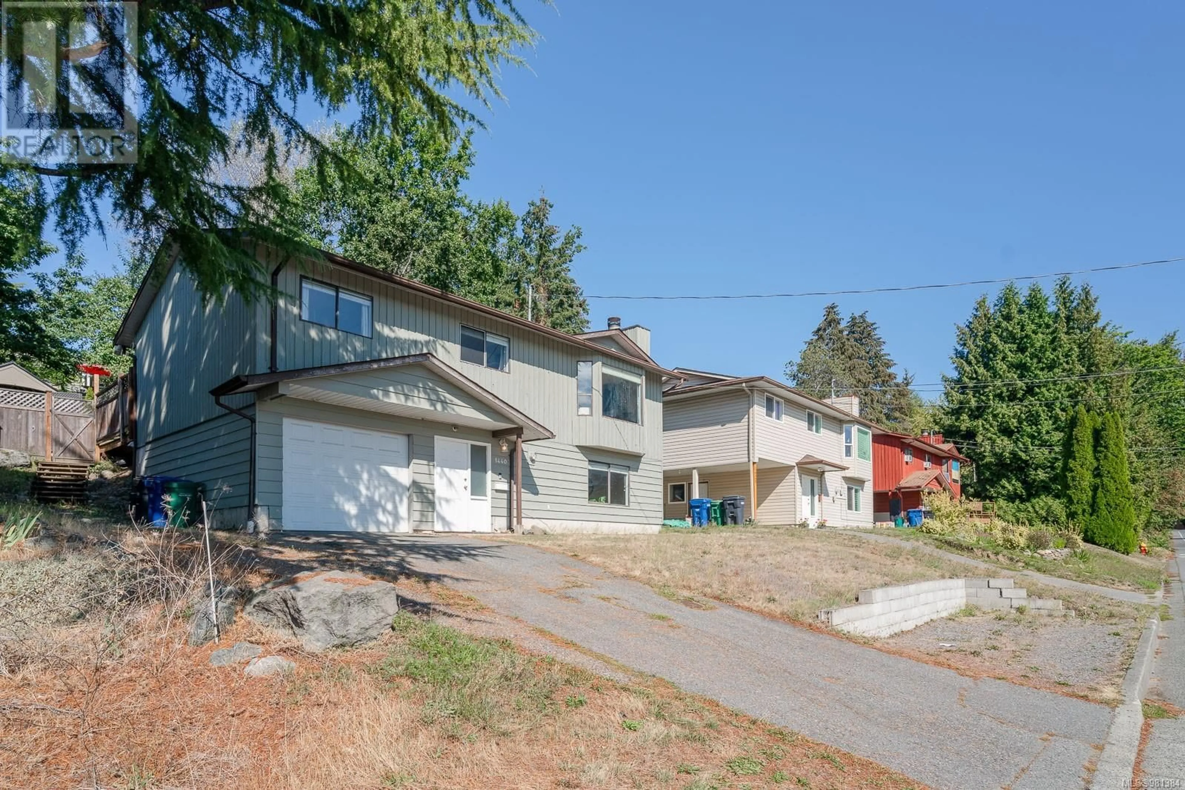 Frontside or backside of a home, the street view for 1440 Bush St, Nanaimo British Columbia V9S1J9