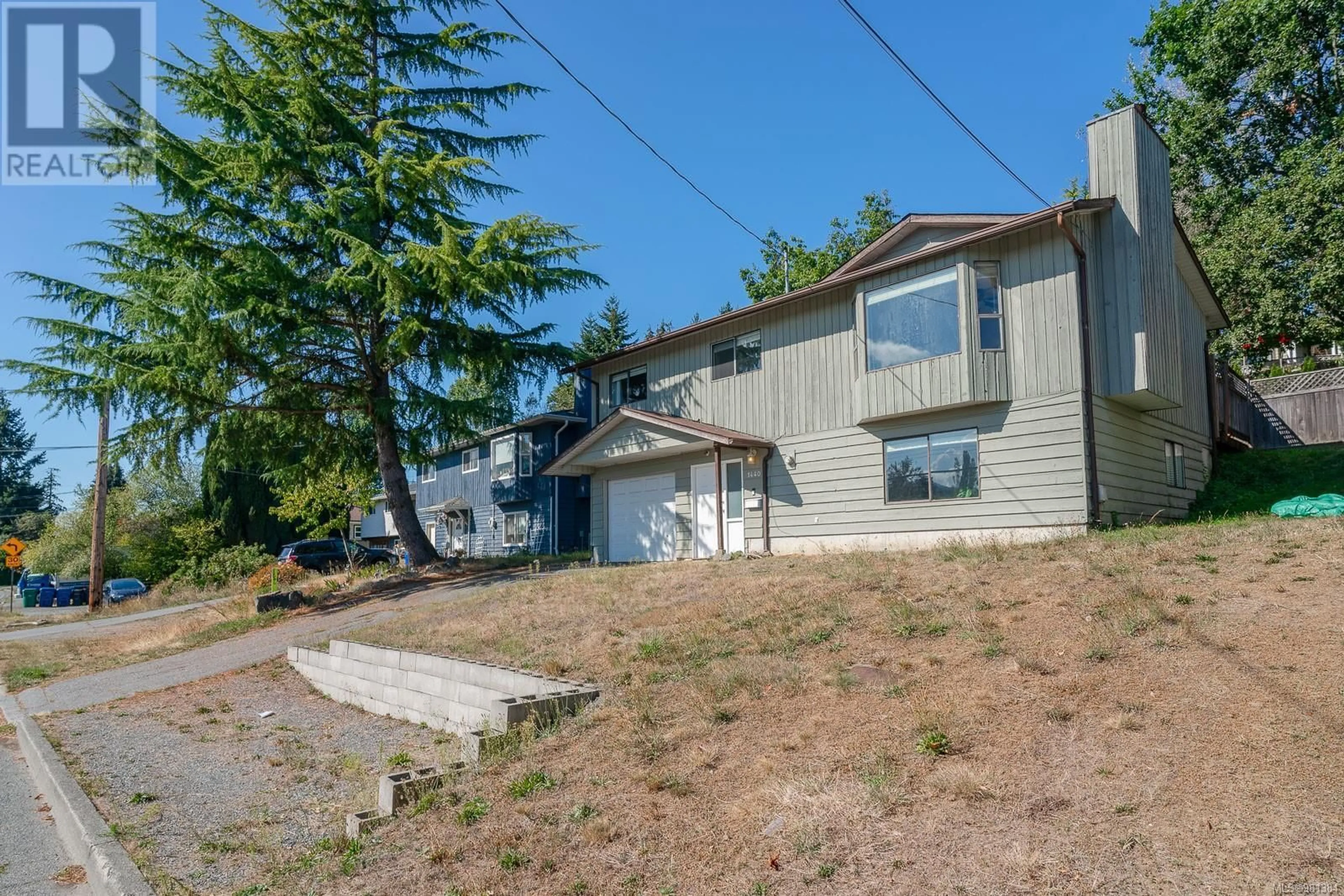 Frontside or backside of a home, cottage for 1440 Bush St, Nanaimo British Columbia V9S1J9