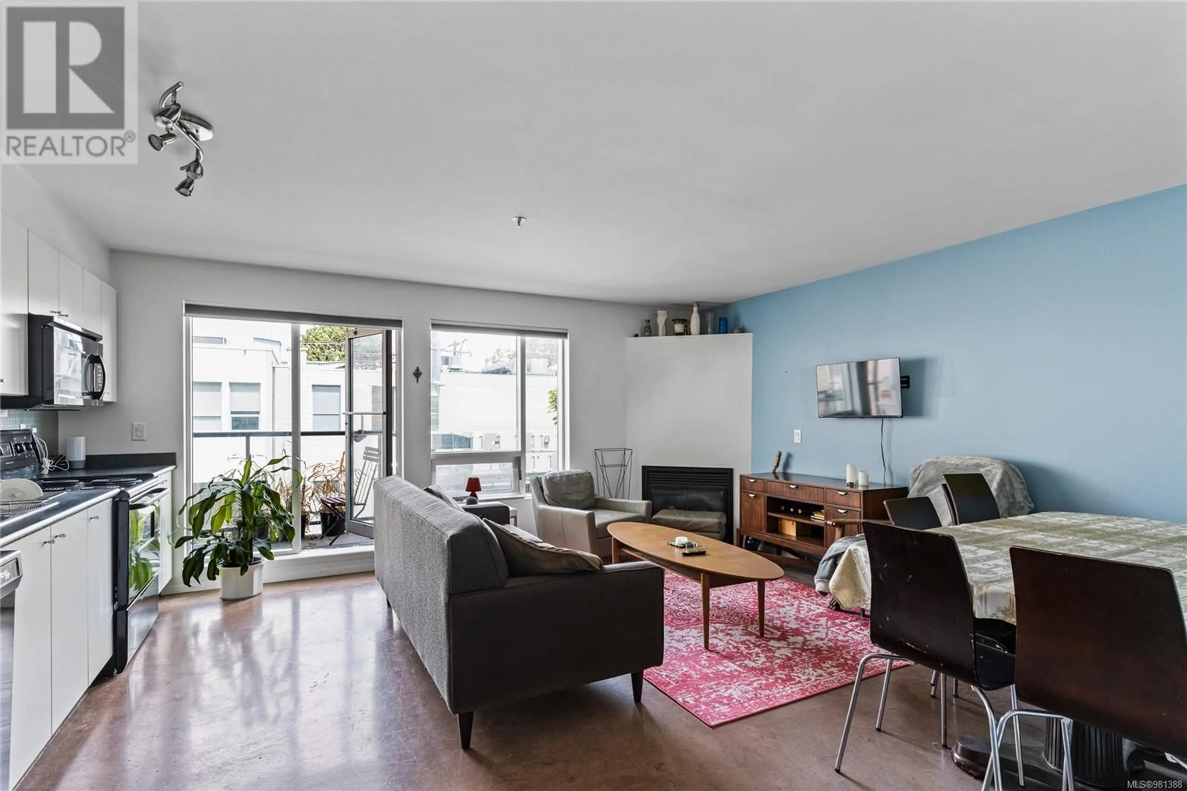 Living room, wood floors for 206 932 Johnson St, Victoria British Columbia V8V3W3