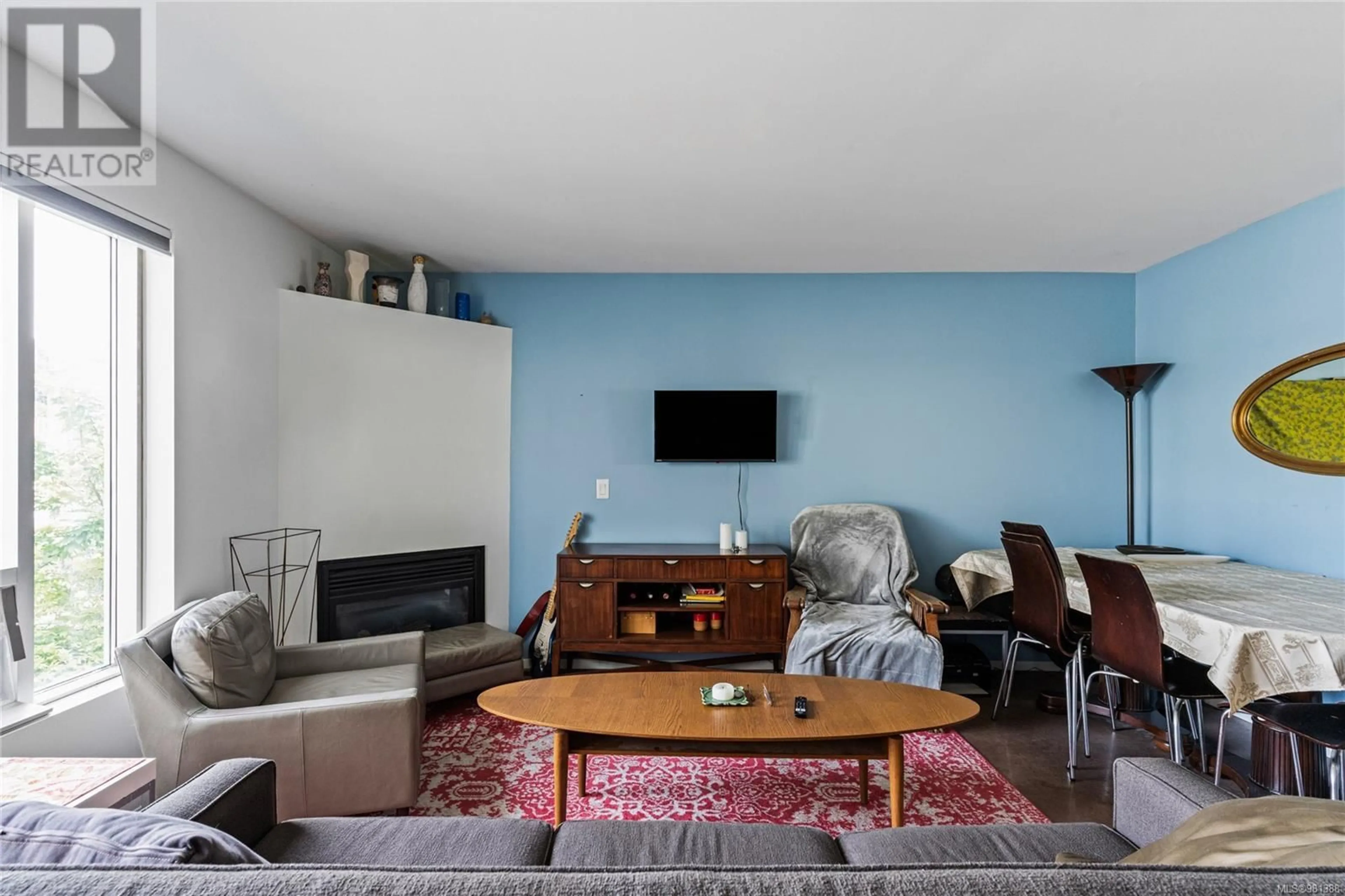 Living room, wood floors for 206 932 Johnson St, Victoria British Columbia V8V3W3