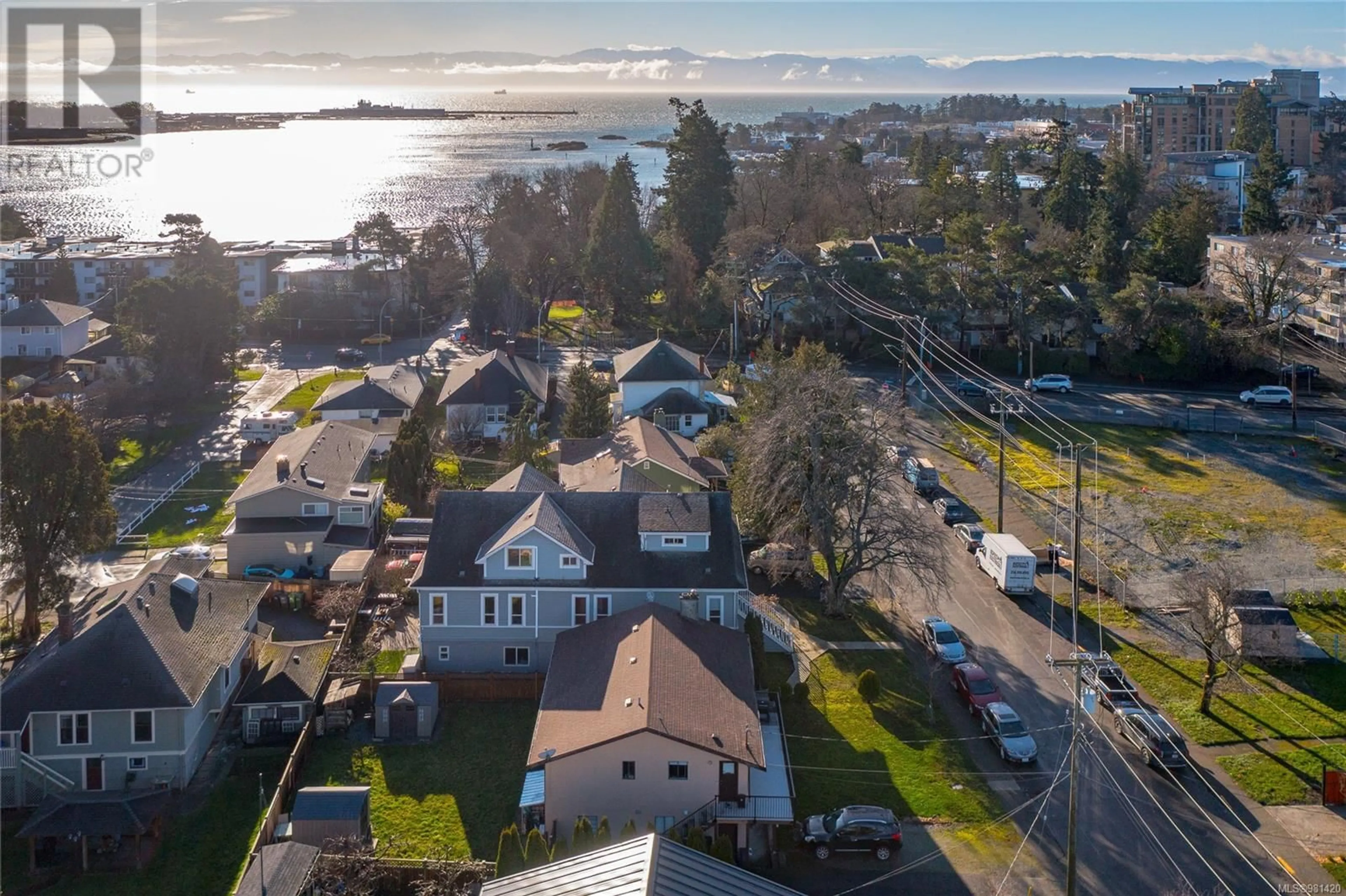 A pic from outside/outdoor area/front of a property/back of a property/a pic from drone, water/lake/river/ocean view for 2 635 Rothwell St, Victoria British Columbia V9A4E3