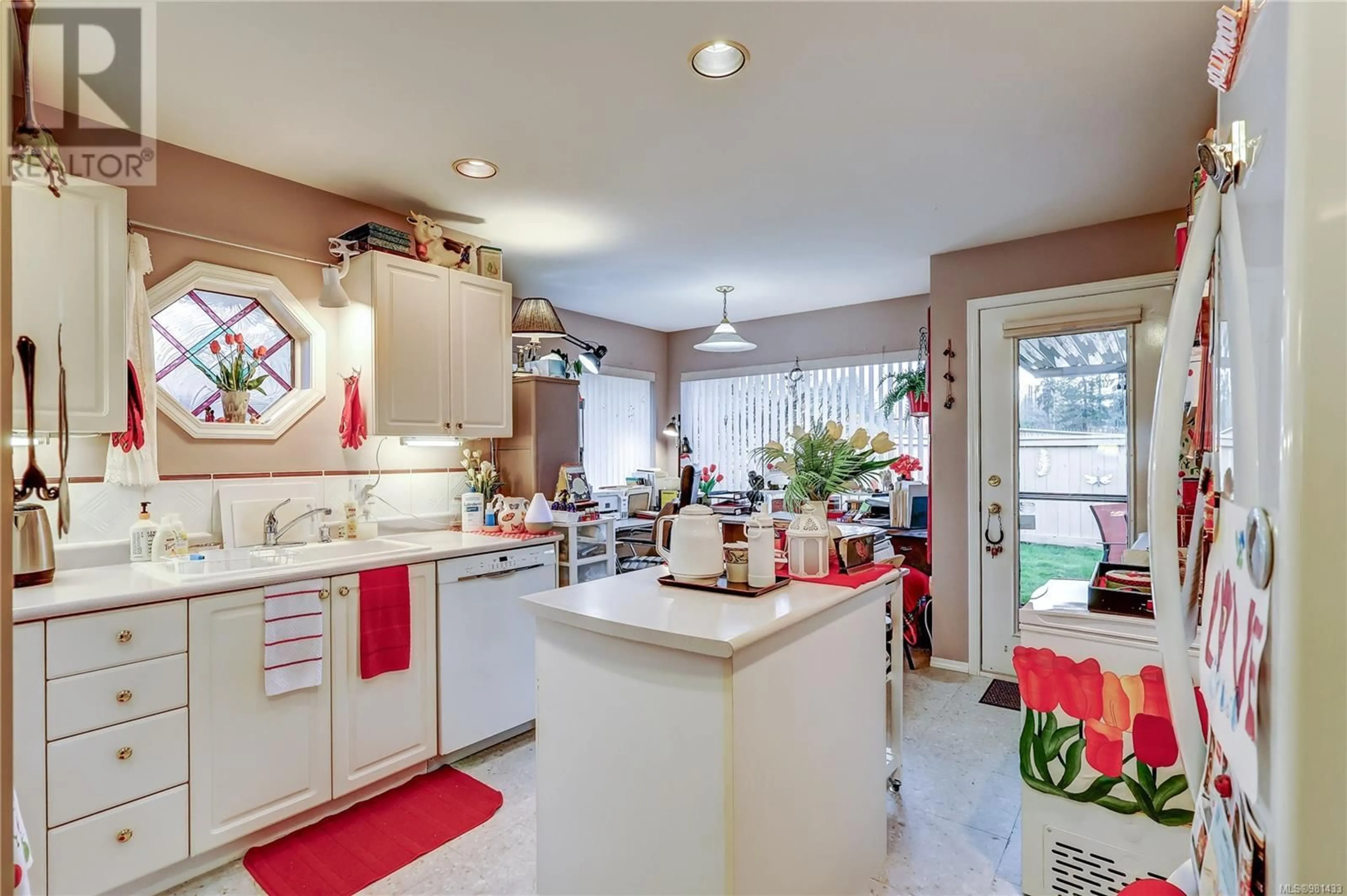 Open concept kitchen, ceramic/tile floor for 7 310 Pym St S, Parksville British Columbia V9P2P4