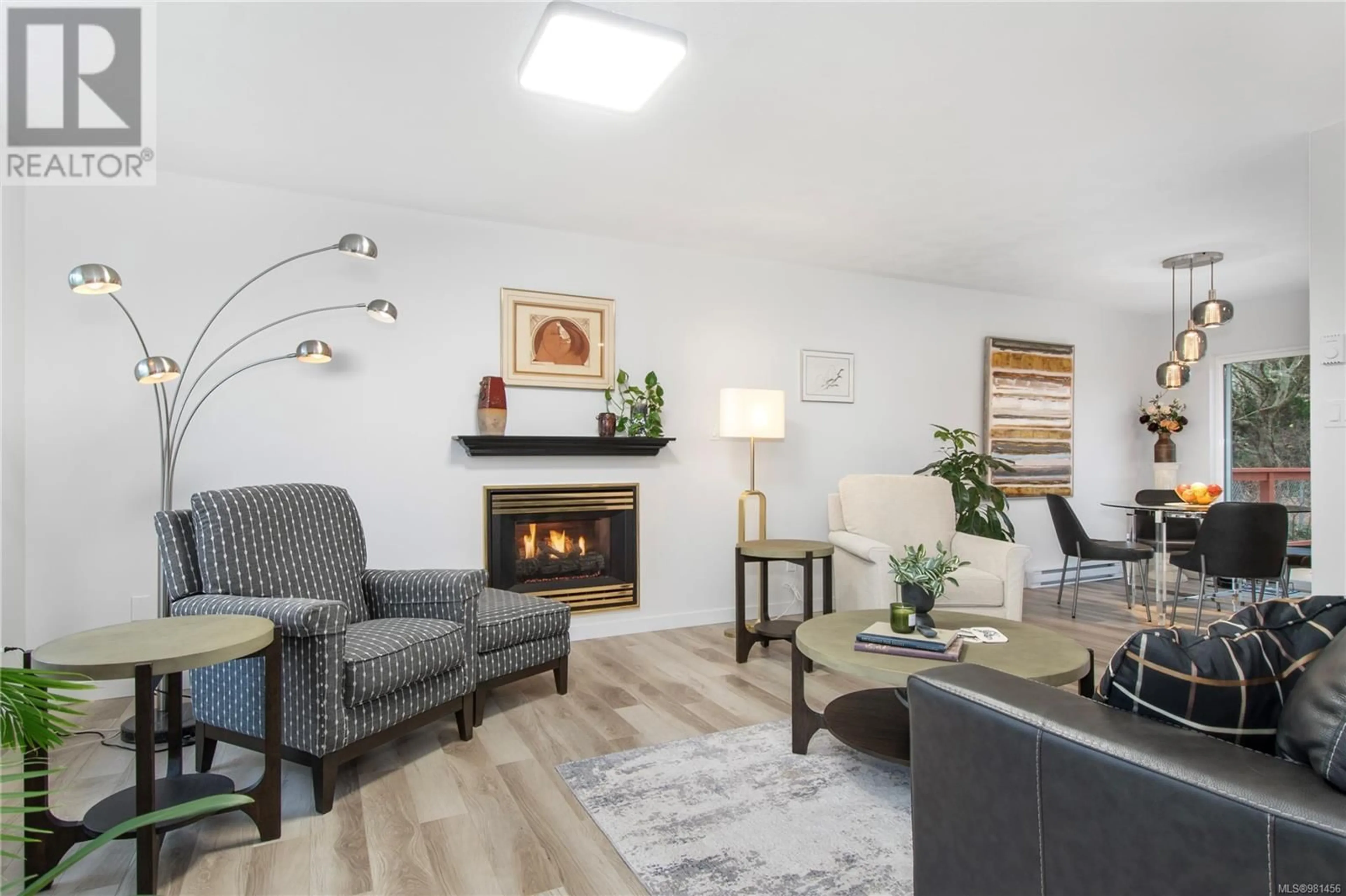 Living room with furniture, wood/laminate floor for 2098 ALBEA Rd, Campbell River British Columbia V9W6T4