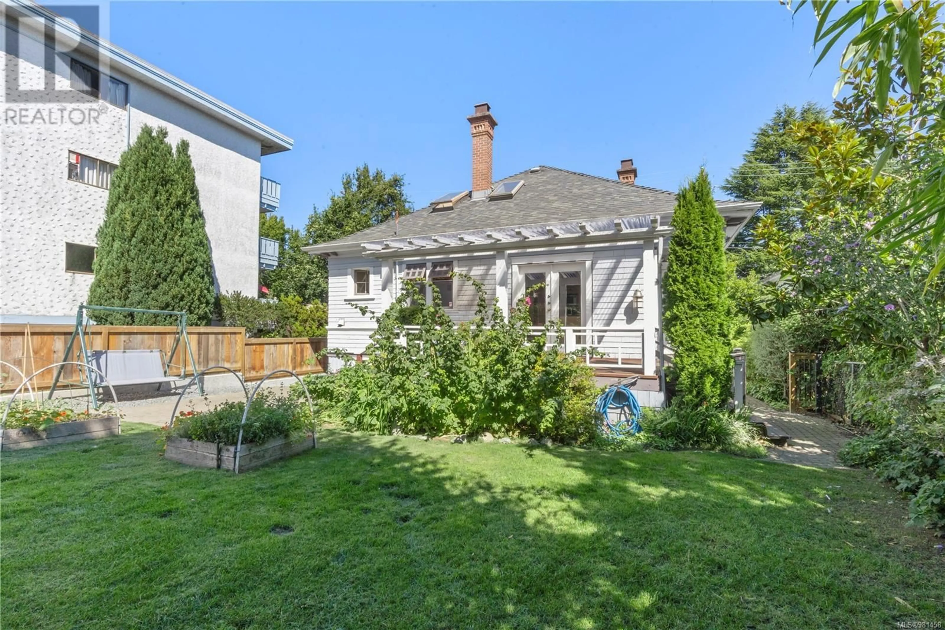 Frontside or backside of a home, the fenced backyard for 487 Superior St, Victoria British Columbia V8V1T5