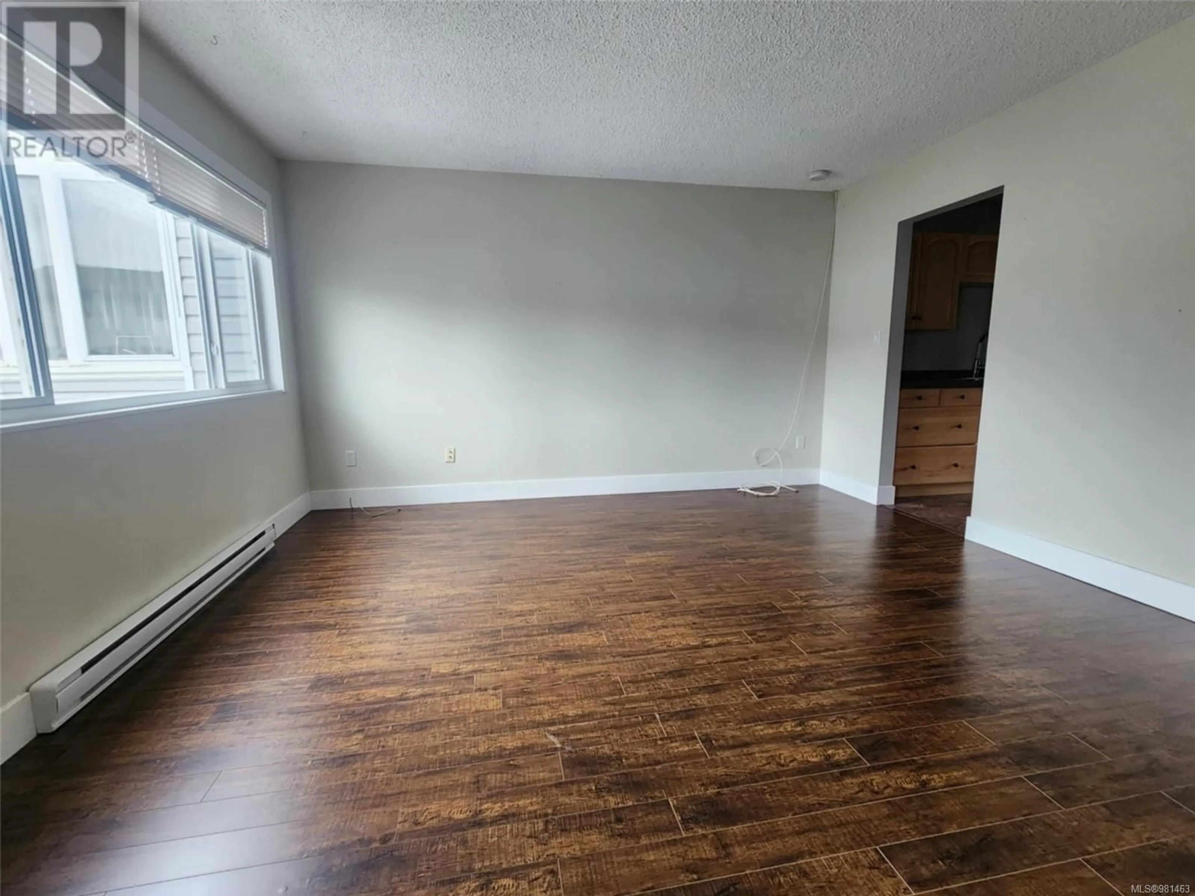 A pic of a room, wood floors for 5221 Gertrude St, Port Alberni British Columbia V9Y6L1