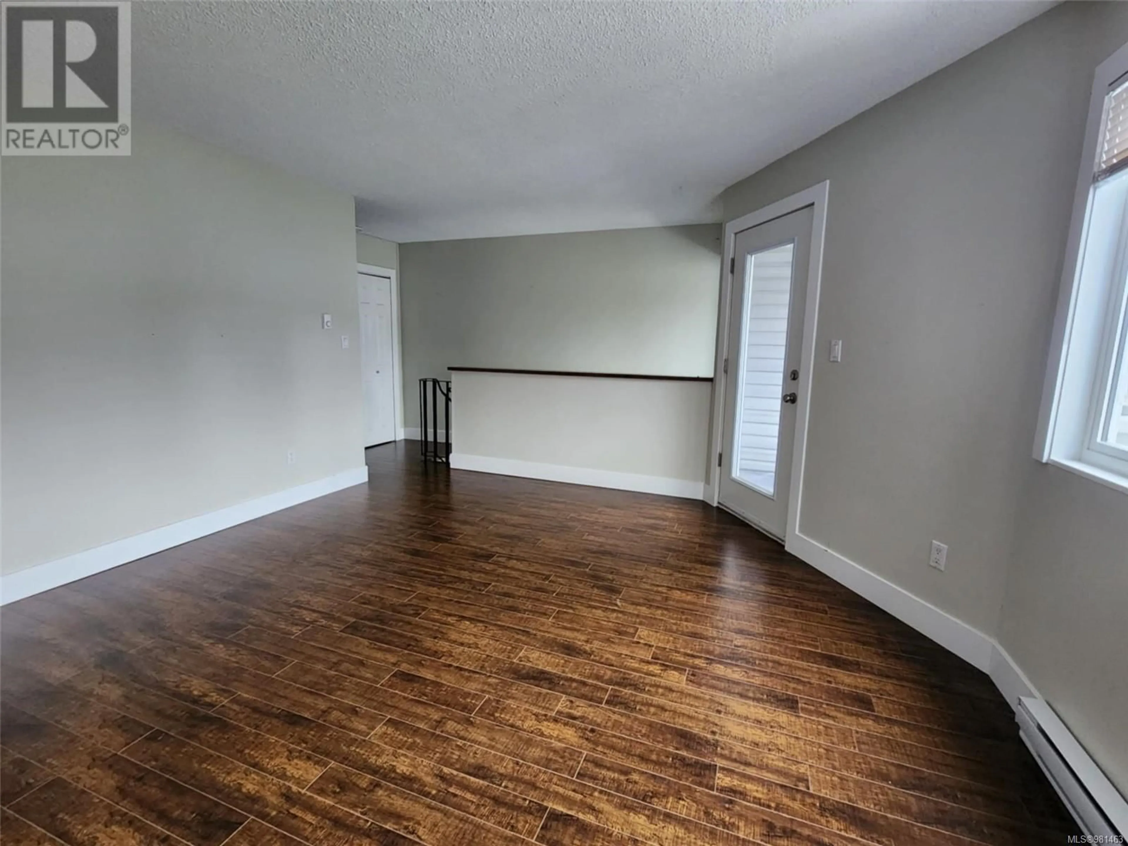 A pic of a room, wood floors for 5221 Gertrude St, Port Alberni British Columbia V9Y6L1