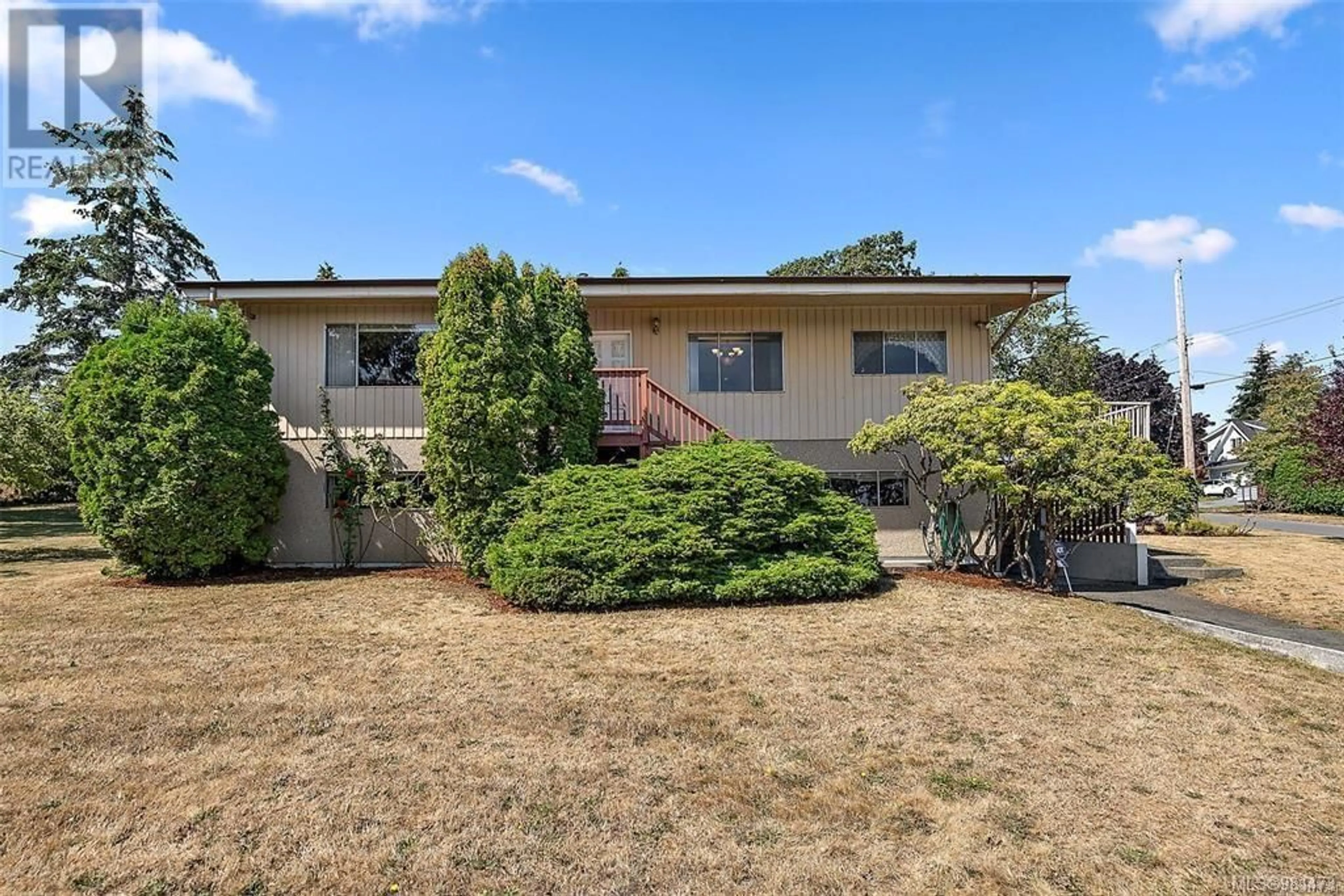 Frontside or backside of a home, the fenced backyard for 7194 Veyaness Rd, Central Saanich British Columbia V8M1M2