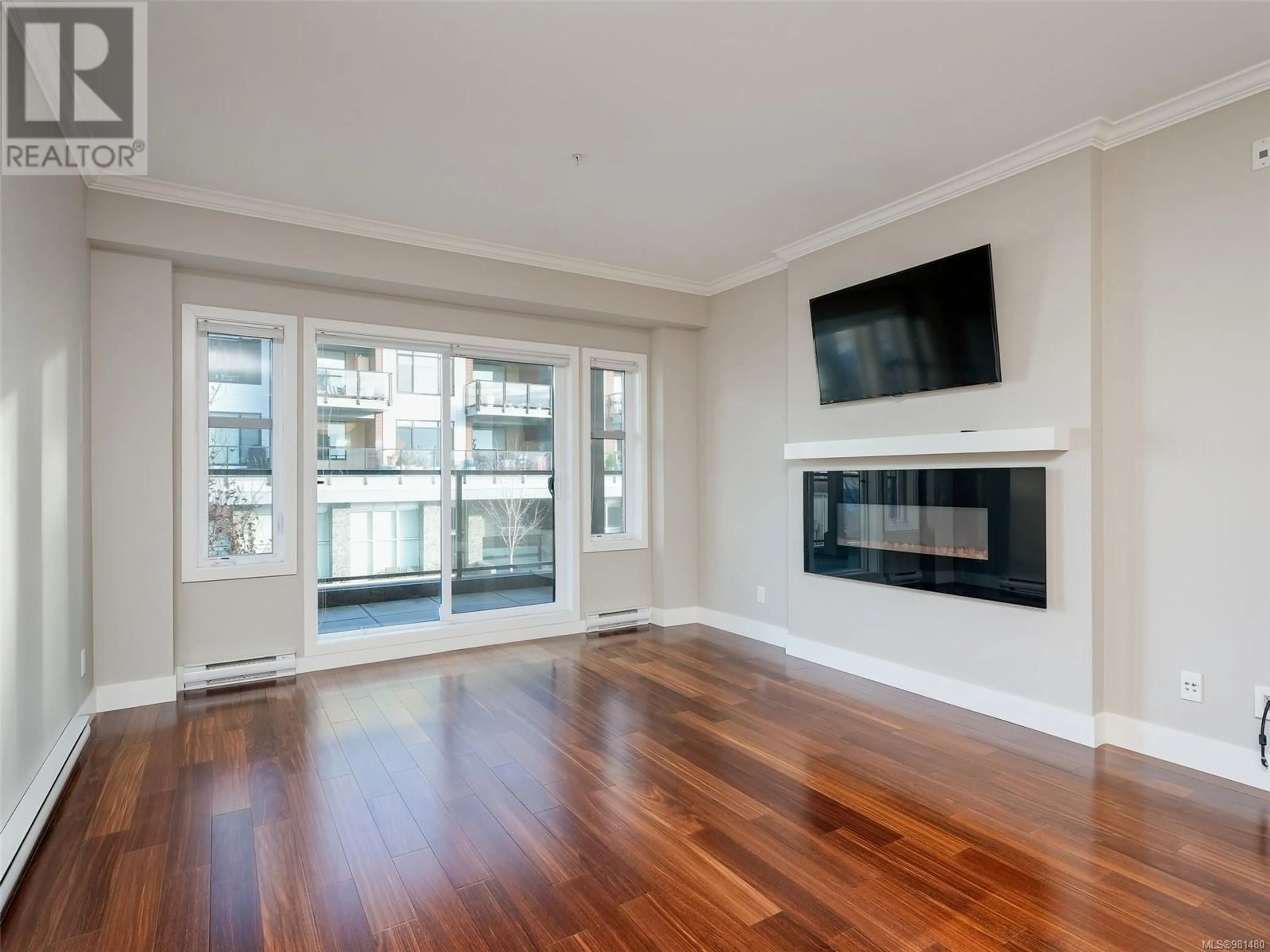 A pic of a room, wood floors for 201 9776 Fourth St, Sidney British Columbia V8L2Z1