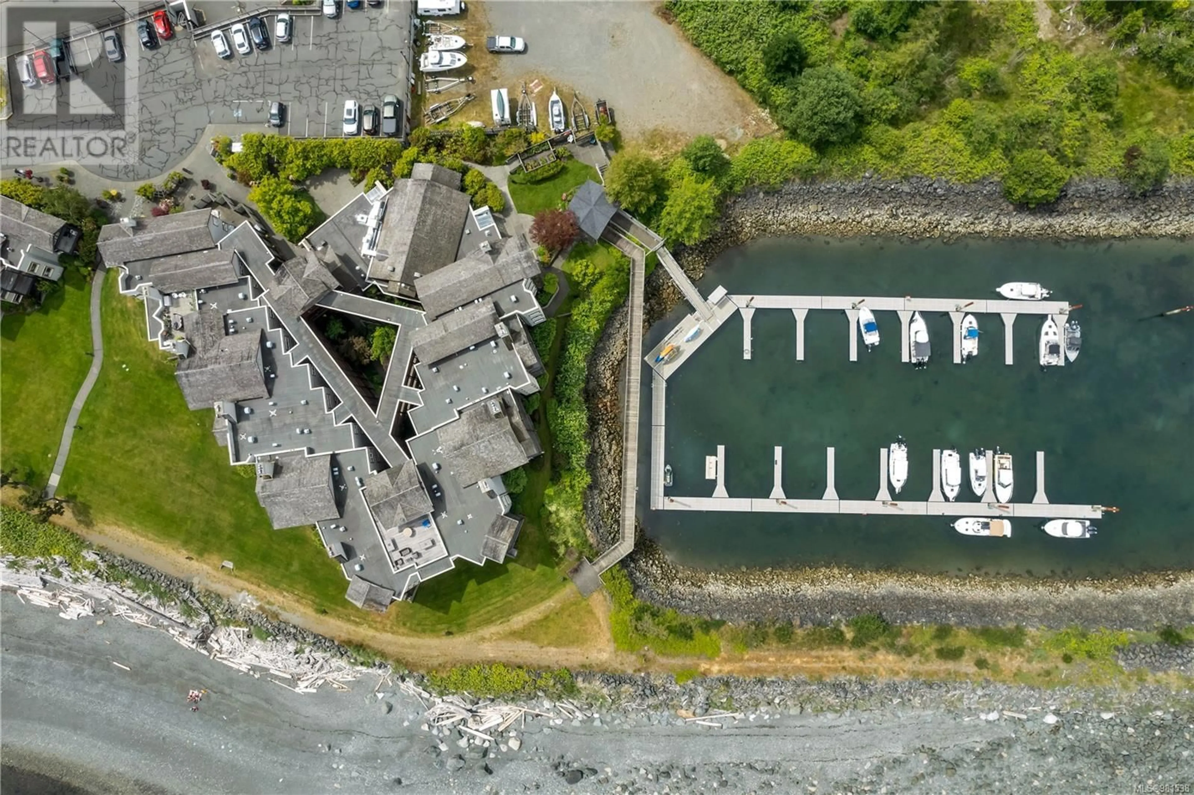 A pic from outside/outdoor area/front of a property/back of a property/a pic from drone, water/lake/river/ocean view for 3207 - 27 ISLAND HIGHWAY SOUTH, Campbell River British Columbia V9W1A2