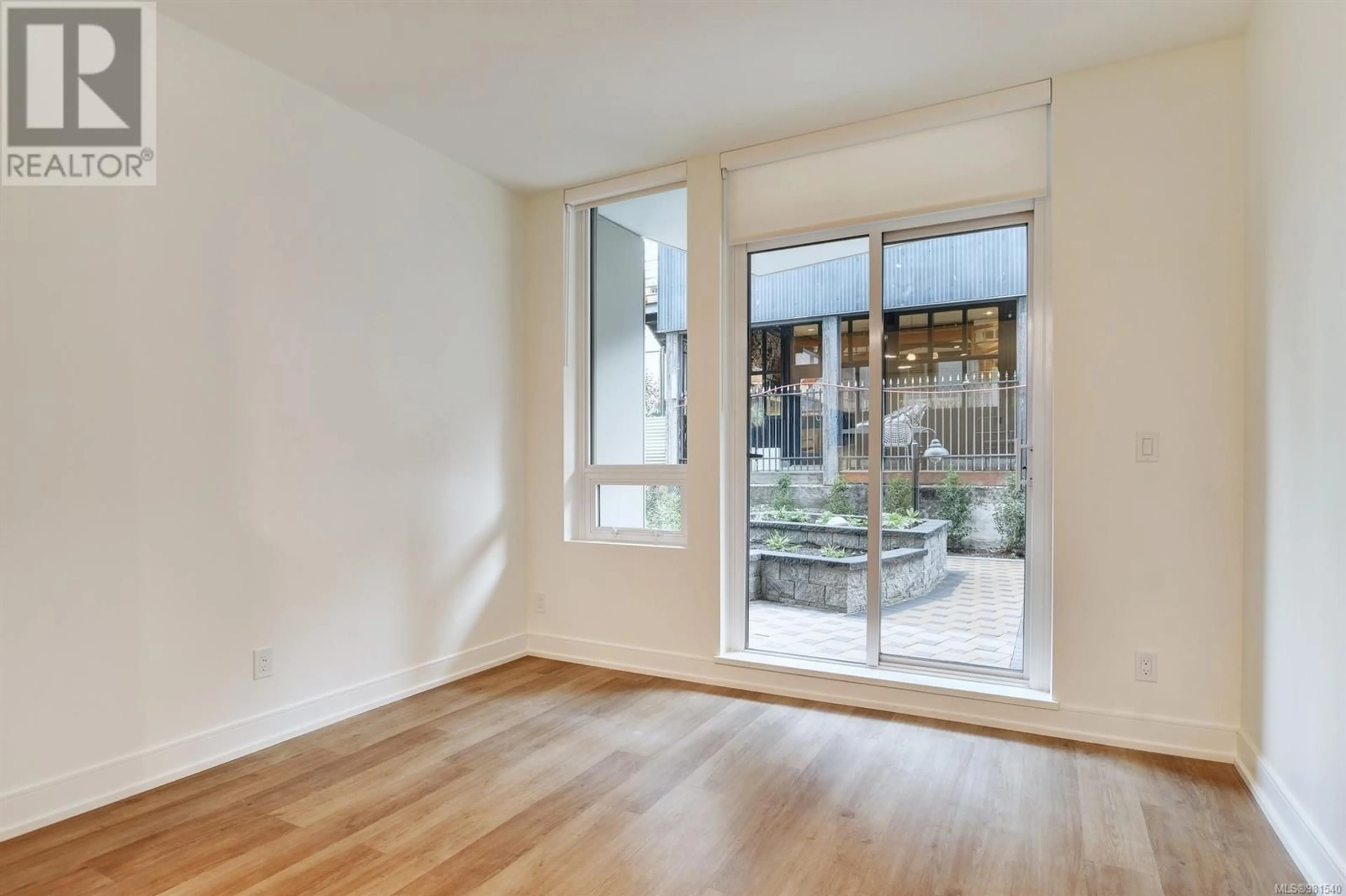 A pic of a room, wood floors for 401 1628 Store St, Victoria British Columbia V8W3K3