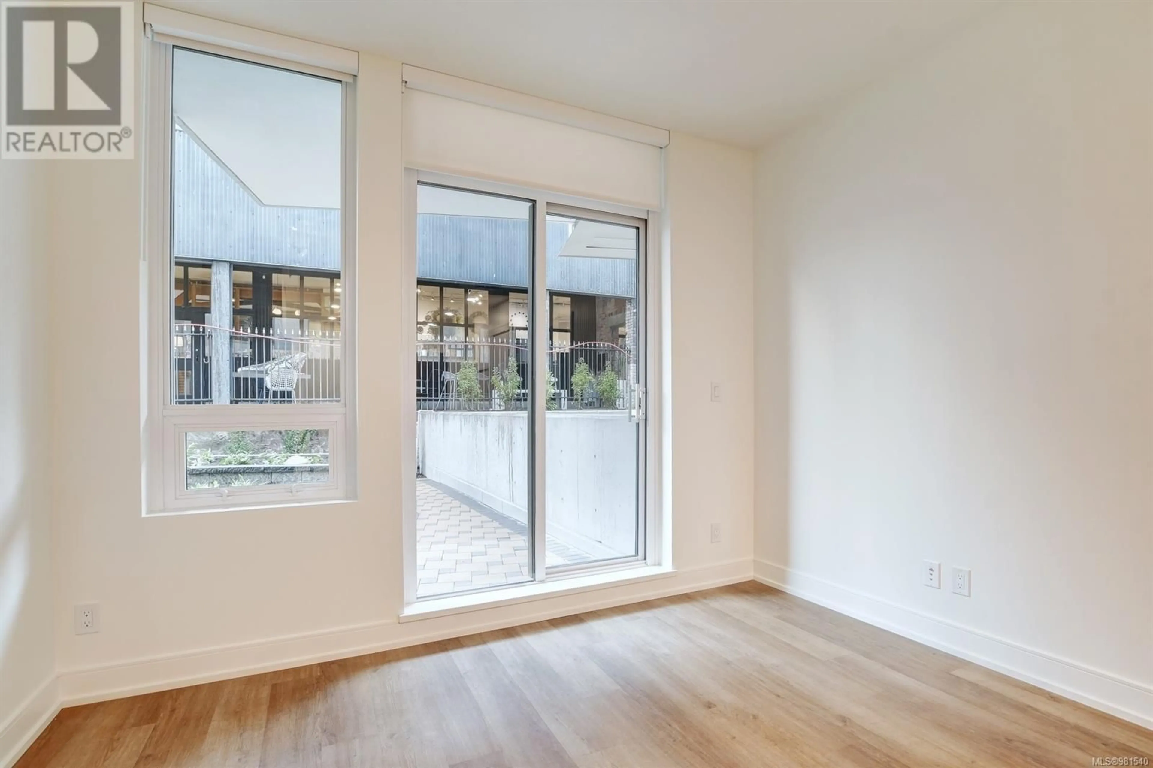 A pic of a room, wood floors for 401 1628 Store St, Victoria British Columbia V8W3K3