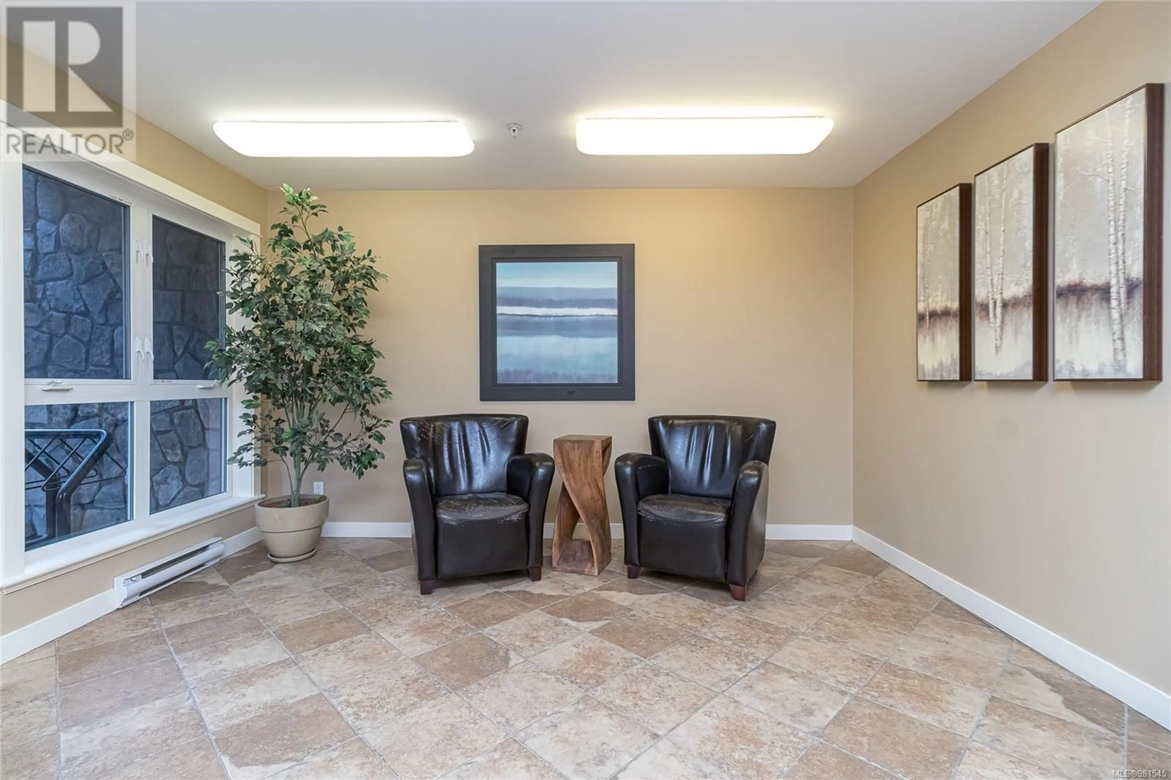 Indoor lobby, carpet floors for 203 201 Nursery Hill Dr, View Royal British Columbia V9B0H7