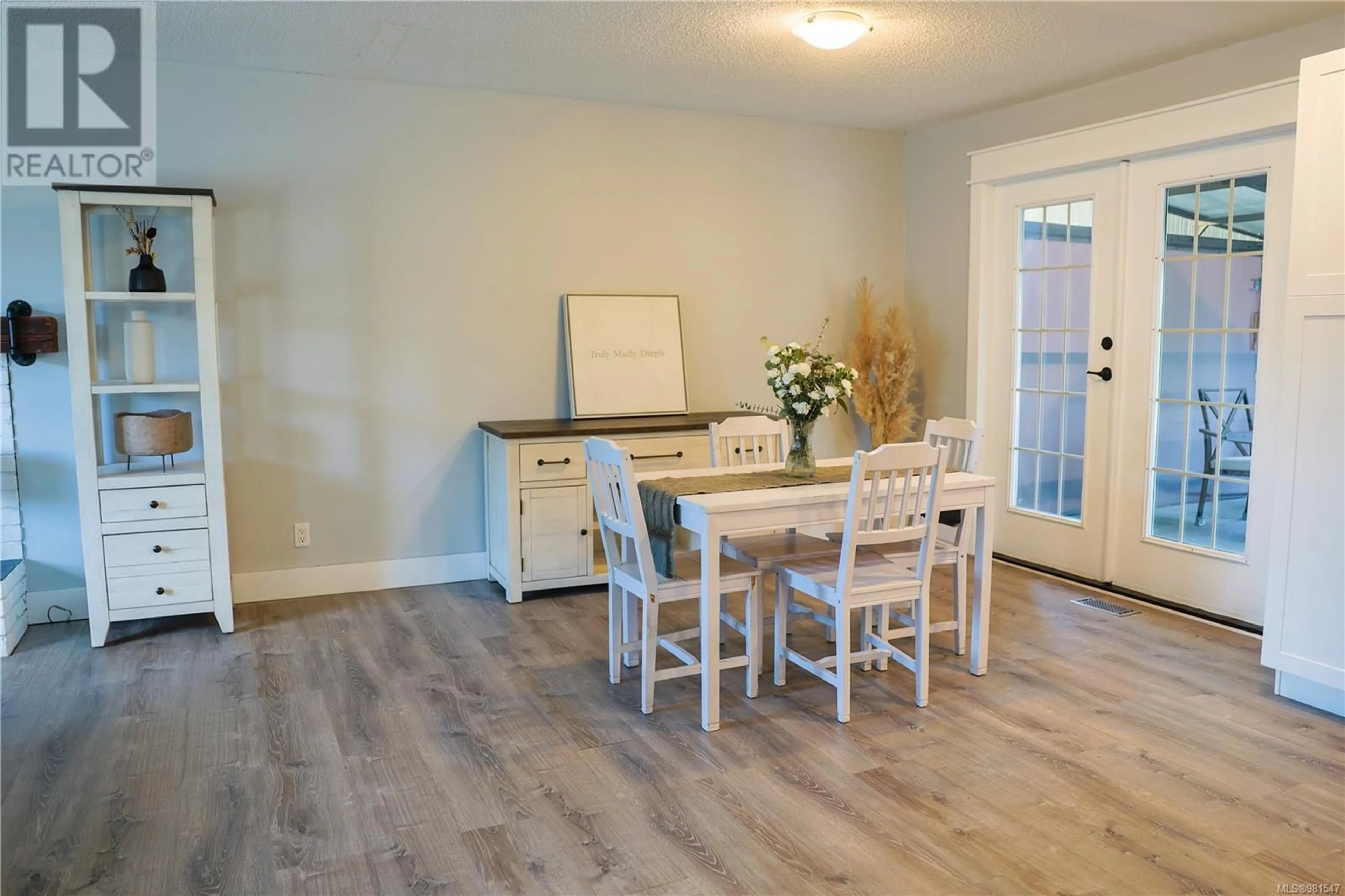 Dining room, wood floors, cottage for 341 Jensen Ave W, Parksville British Columbia V9P1K2