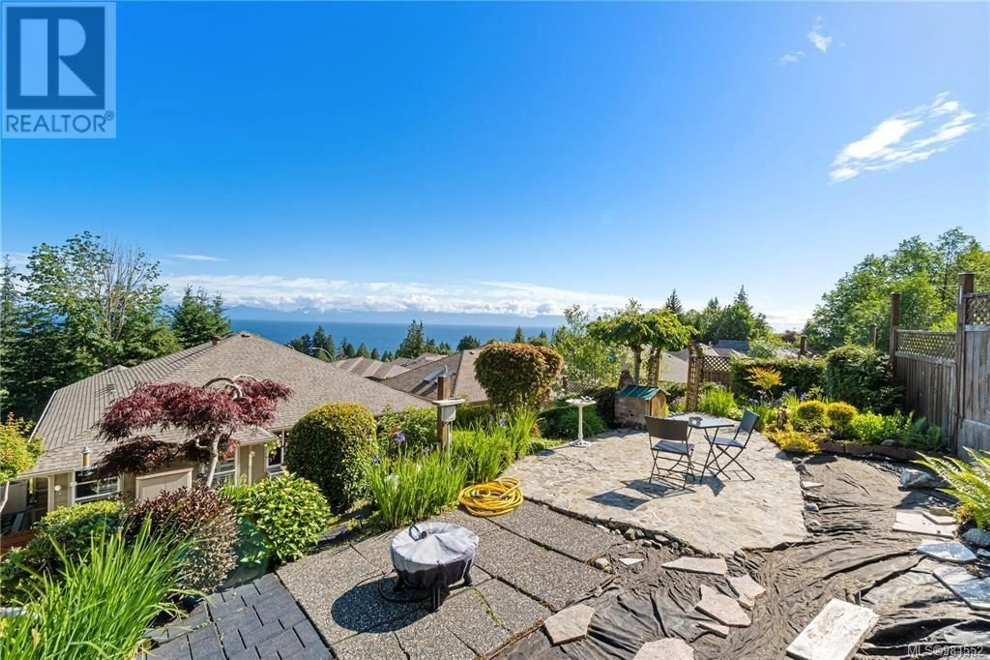 Patio, the fenced backyard for 5565 Norton Rd, Nanaimo British Columbia V9T6S2