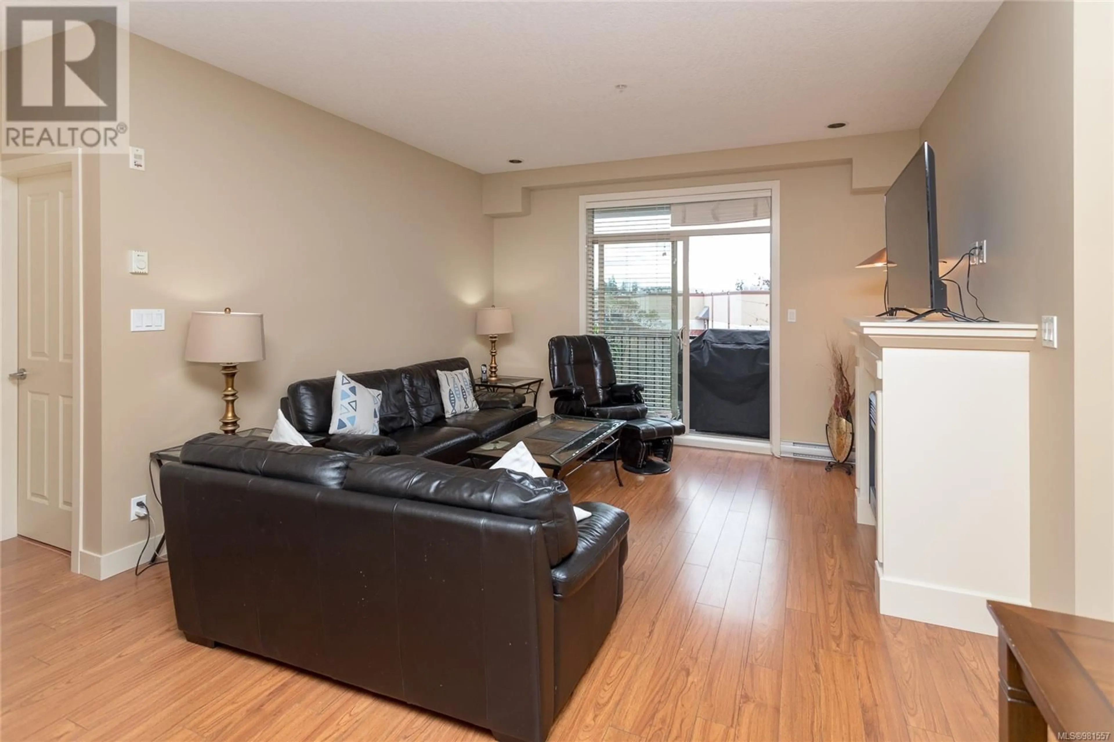 Living room, wood floors for 513 623 Treanor Ave, Langford British Columbia V9B0B1